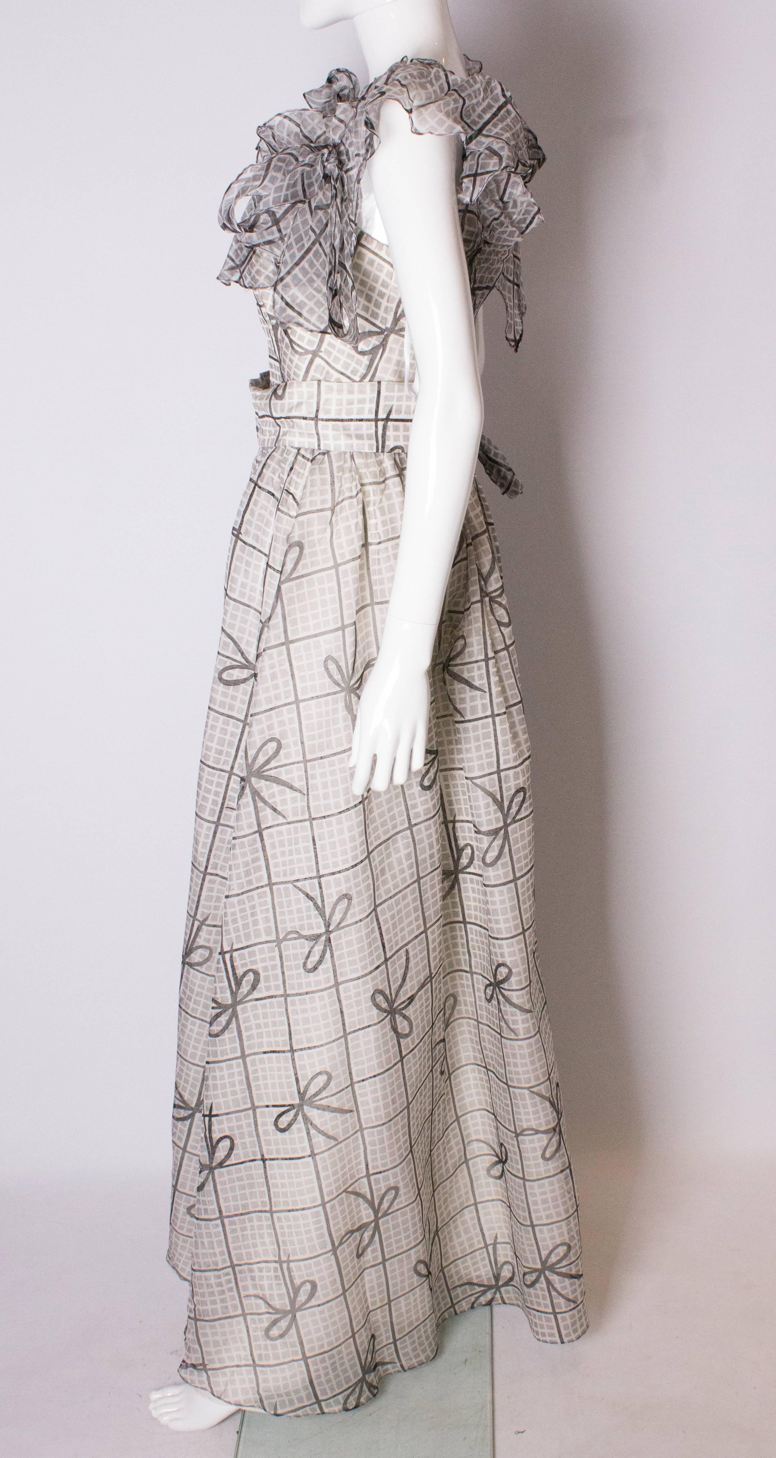 Gray A Vintage 1970s grey printed silk evening gown by Gina Fratini For Sale