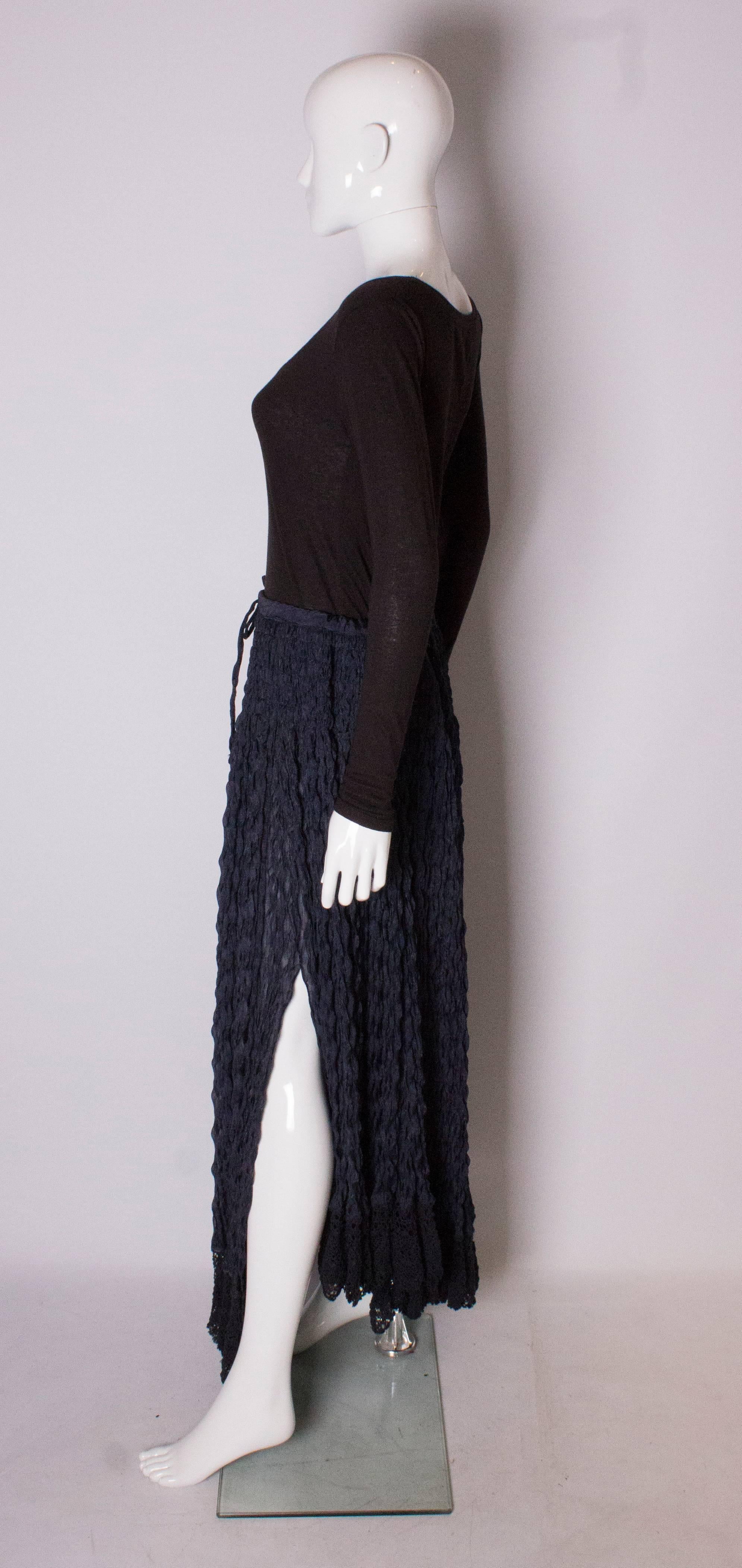 Women's A Vintage 1990s dark navy long ruffle summer skirt by Romeo Gigli 