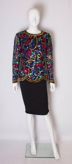 A vintage 1980s fully beaded evening top by Oleg Cassini, Black Tie Line