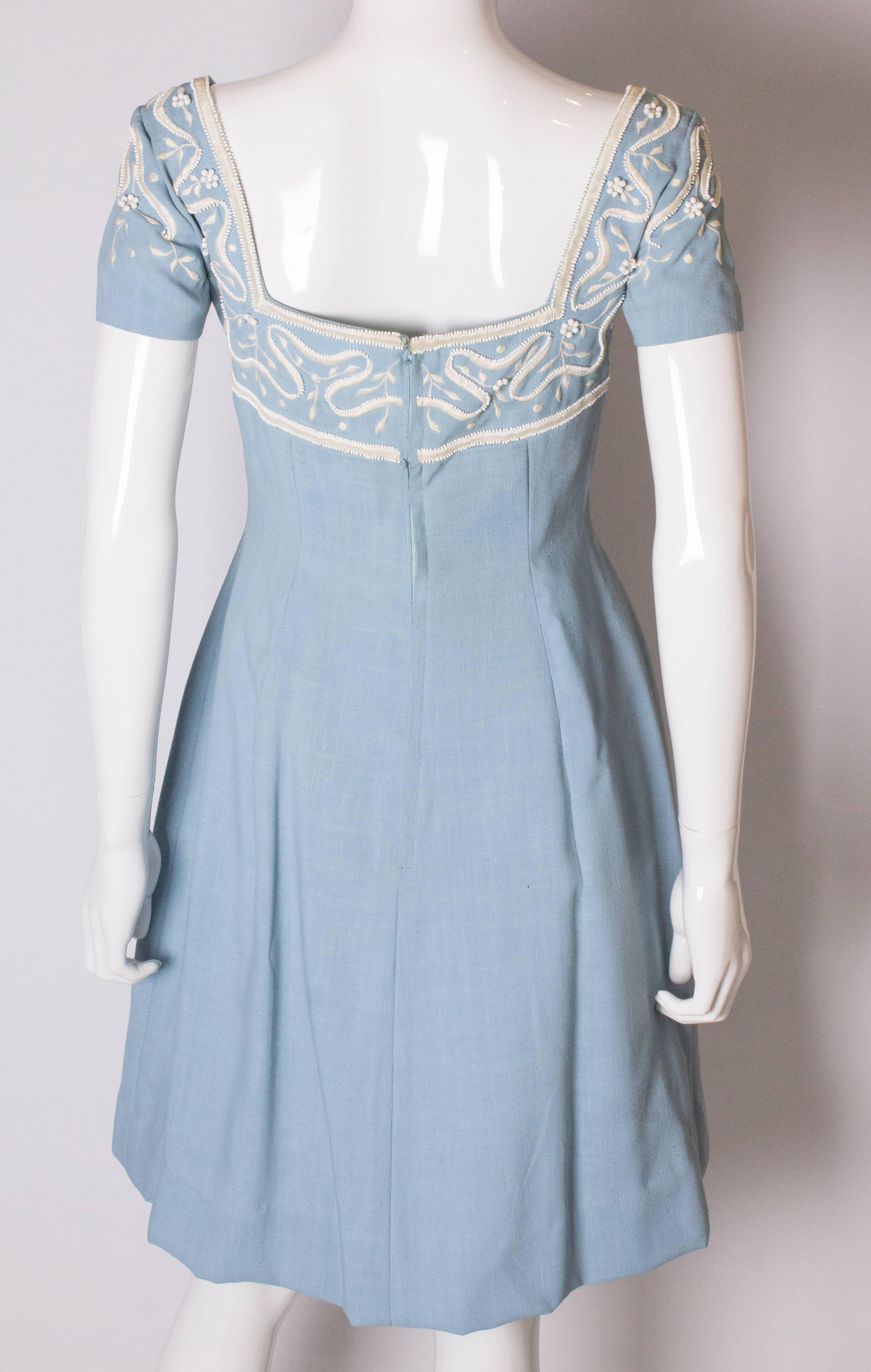 A Vintage 1960s pale blue cotton and beaded day dress by Jean Allen London  1