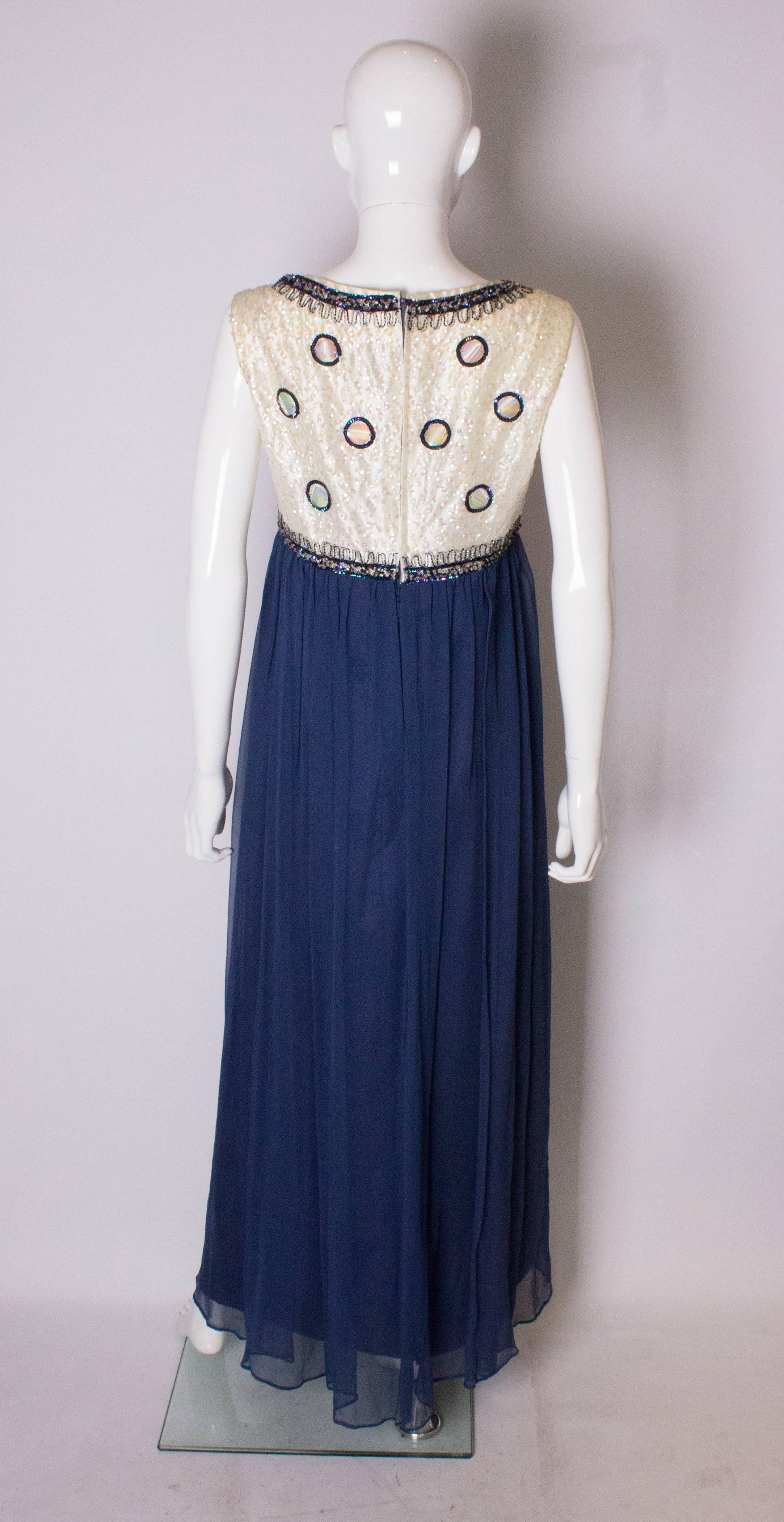 A Vintage 1960s sequin blue chiffon evening gown by Laura Phillips 1