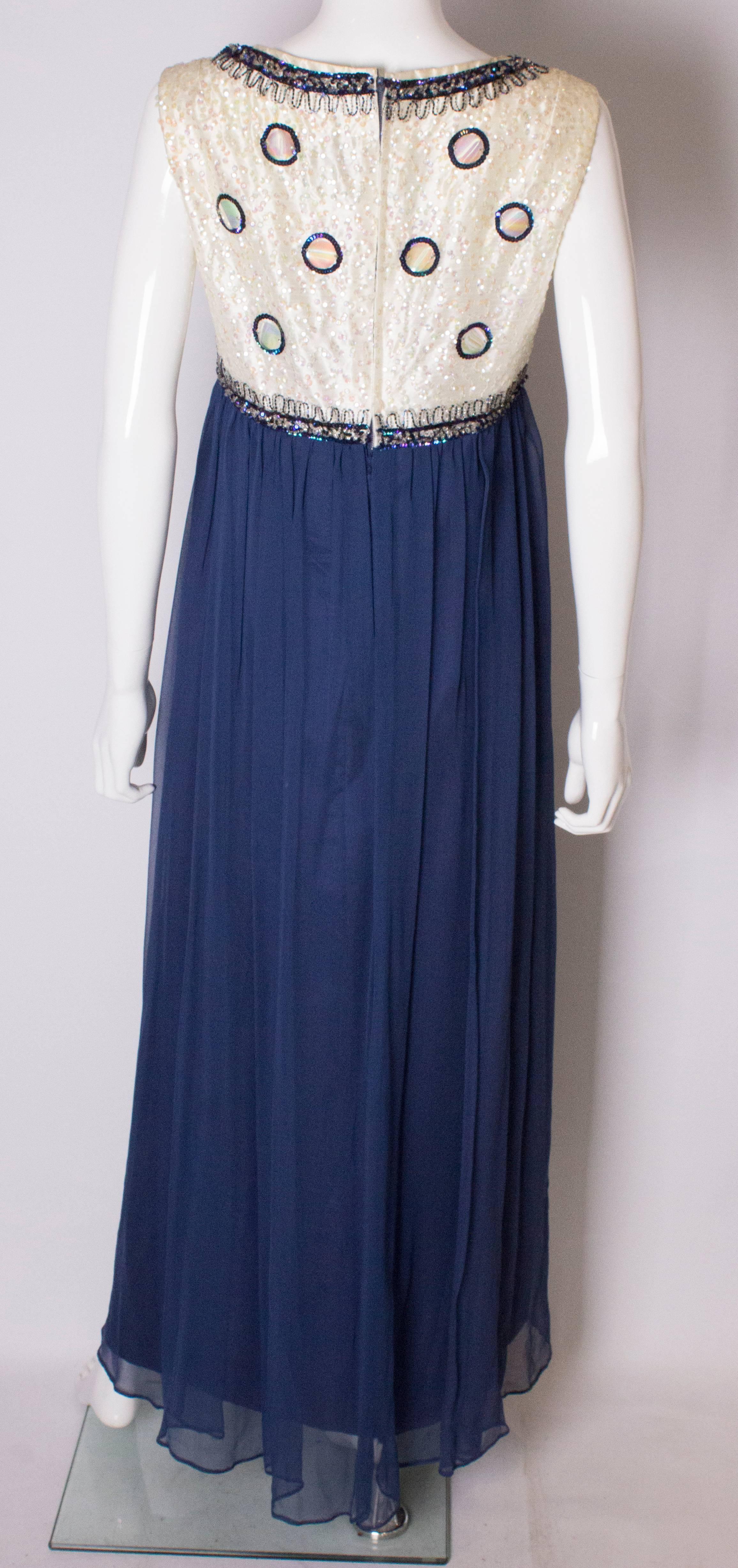A Vintage 1960s sequin blue chiffon evening gown by Laura Phillips 2