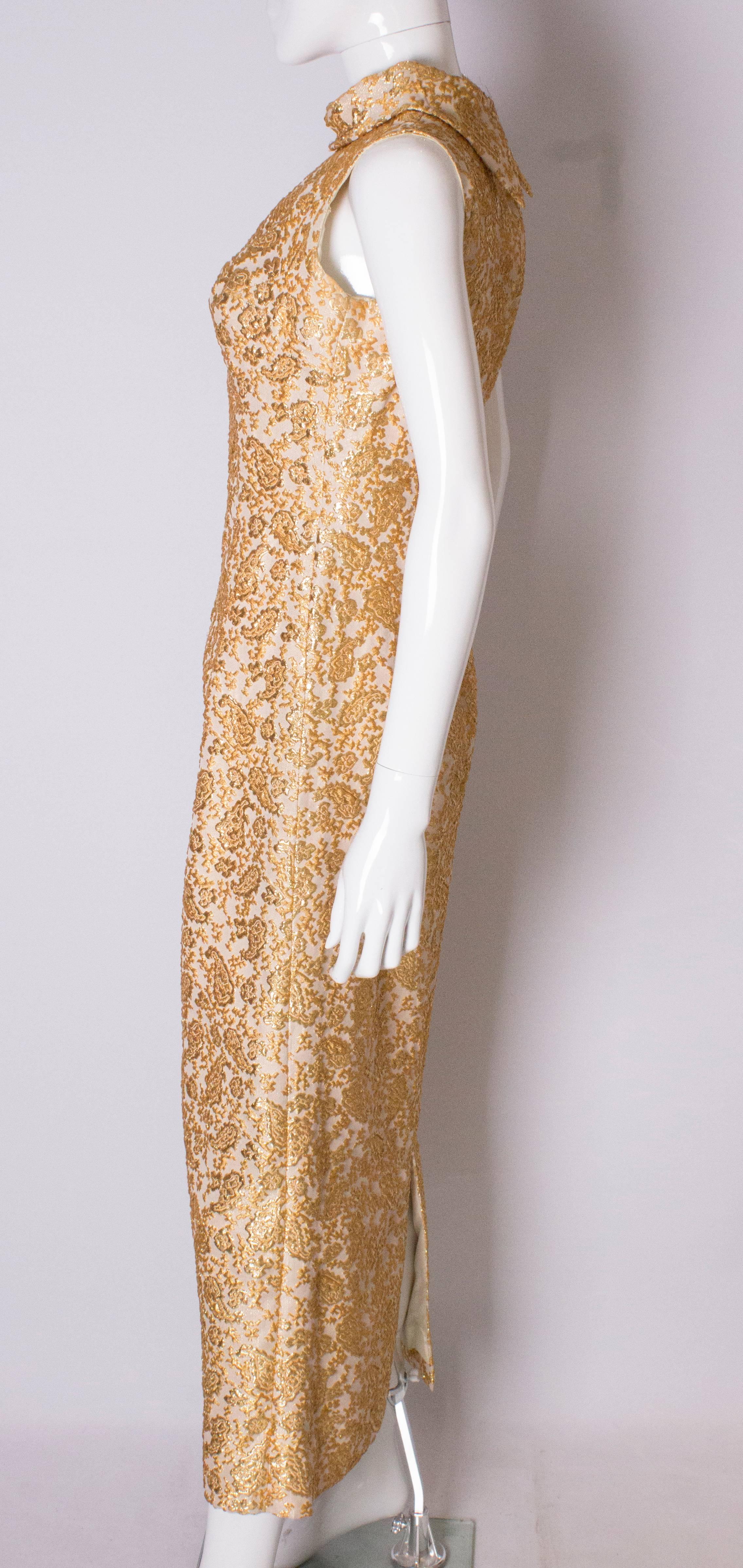 A Vintage 1960s Gold brocade high neck Evening Gown 1