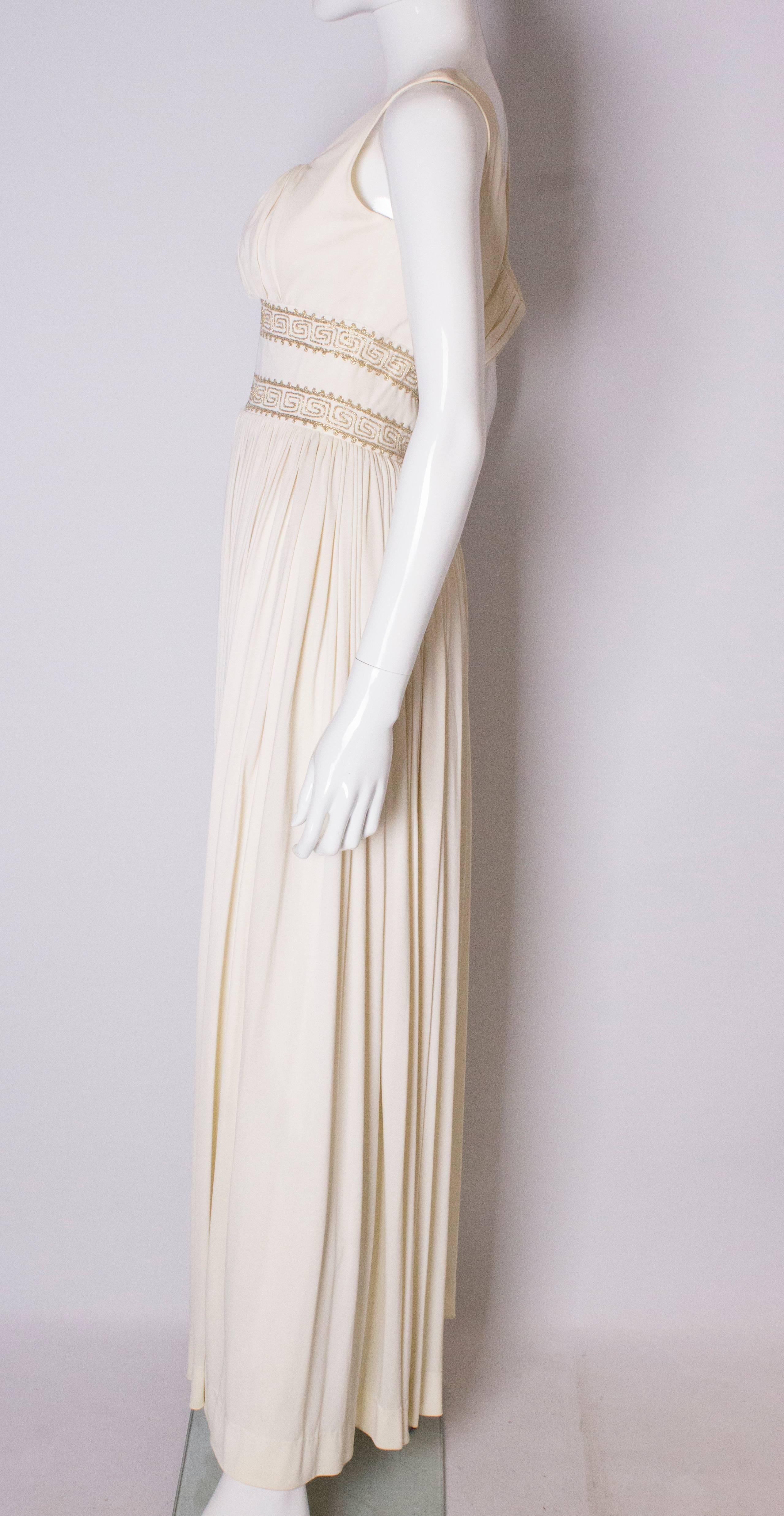 Beige A Vintage 1970s white Grecian Style evening Gown