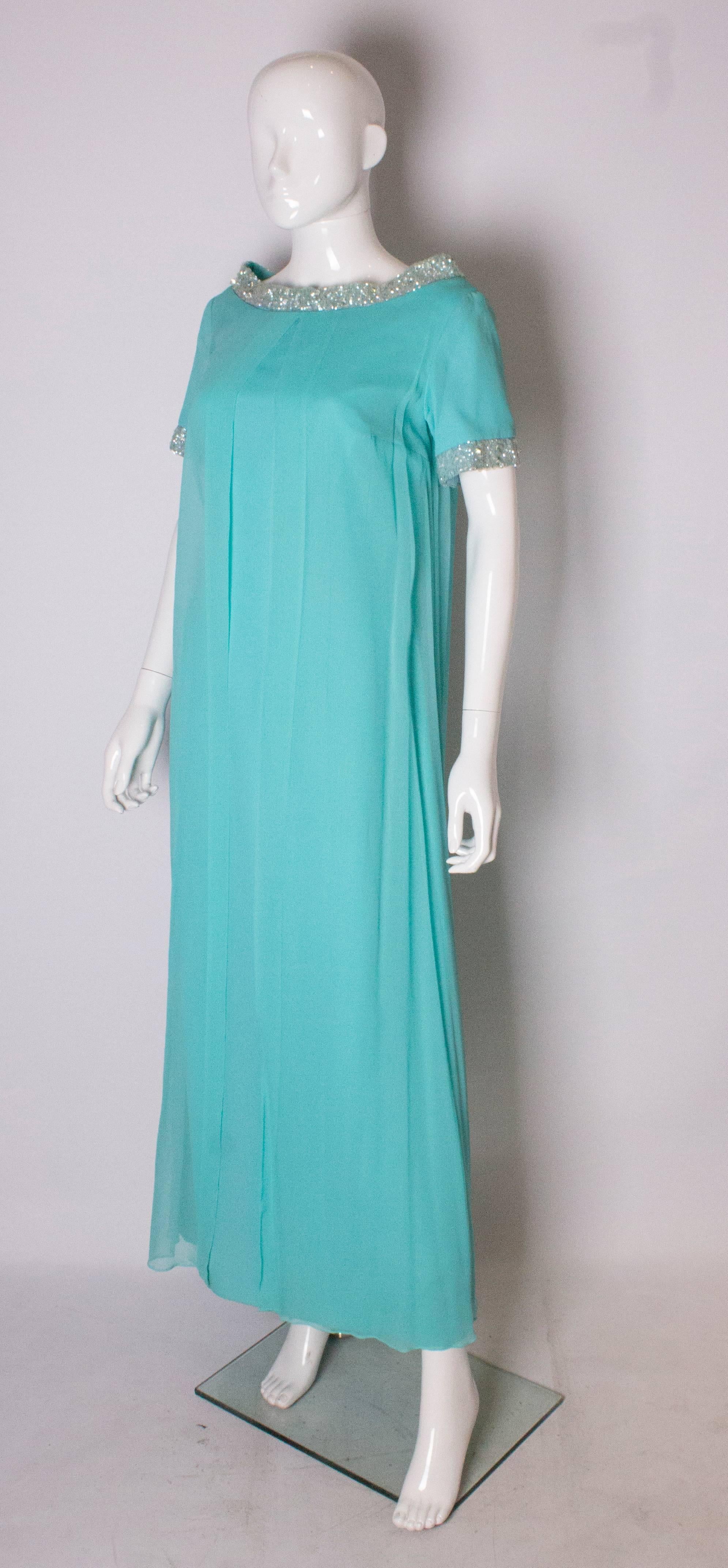 Blue A Vintage 1960s pale blue evening gown by Polmarks Models