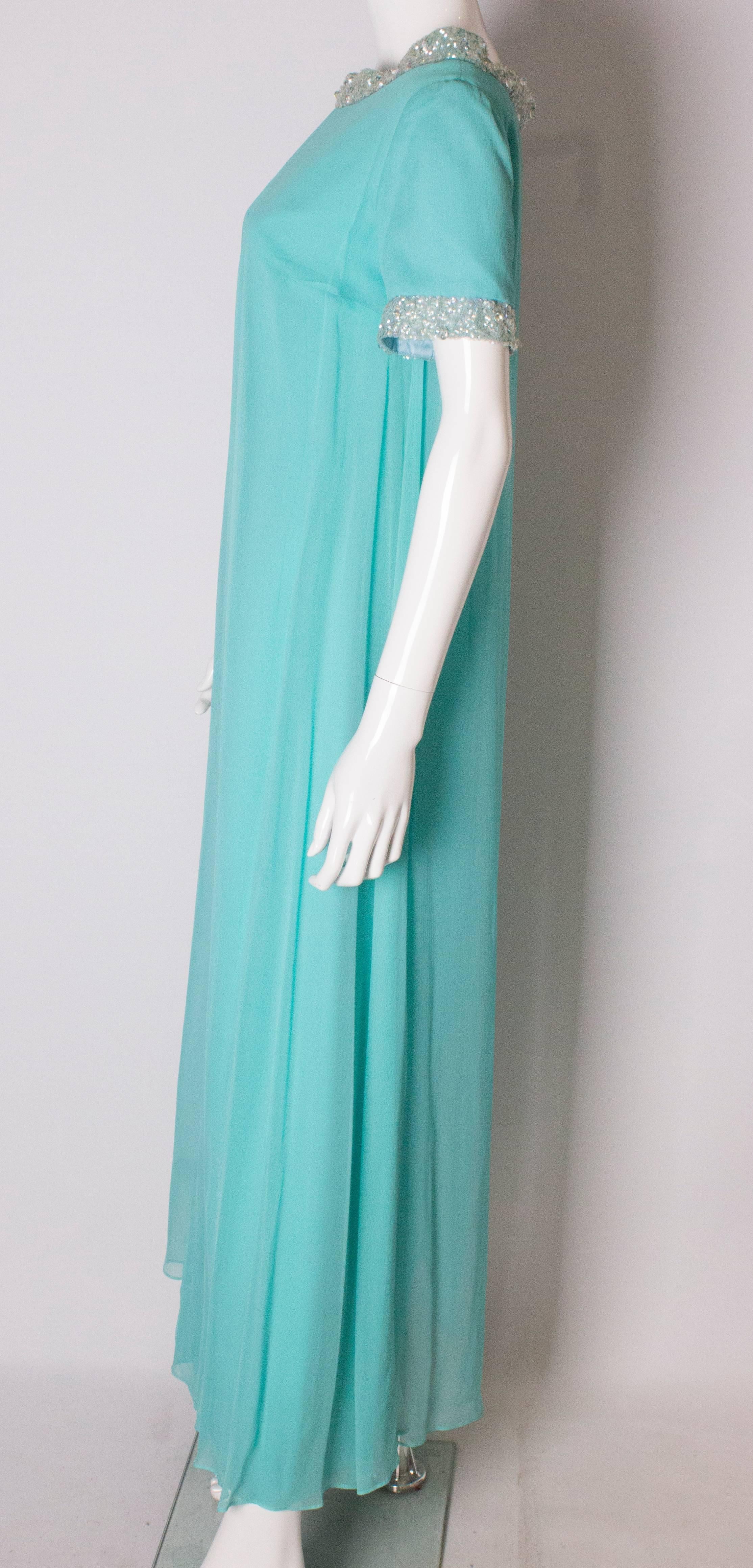 A Vintage 1960s pale blue evening gown by Polmarks Models 1