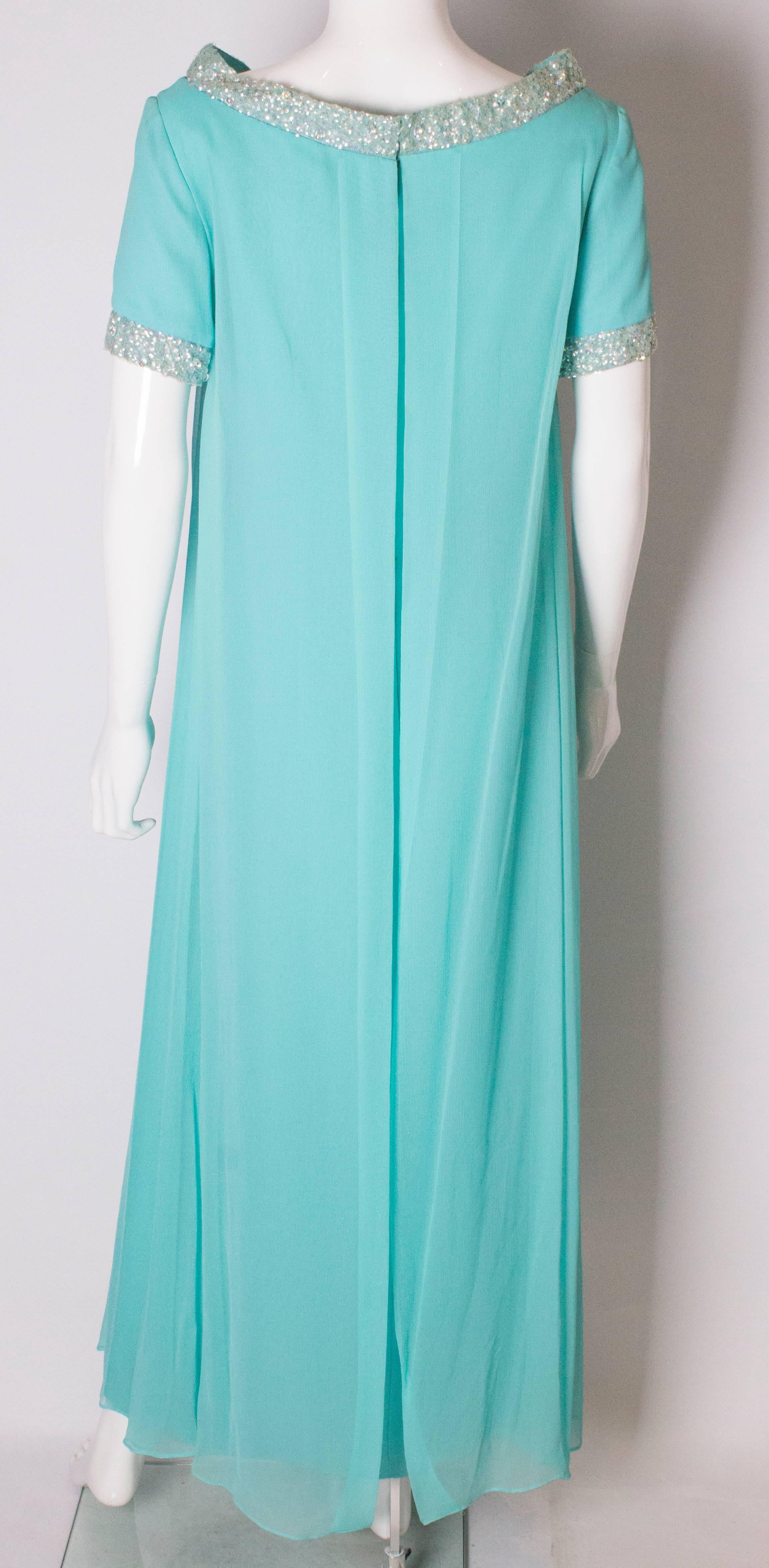 A Vintage 1960s pale blue evening gown by Polmarks Models 3