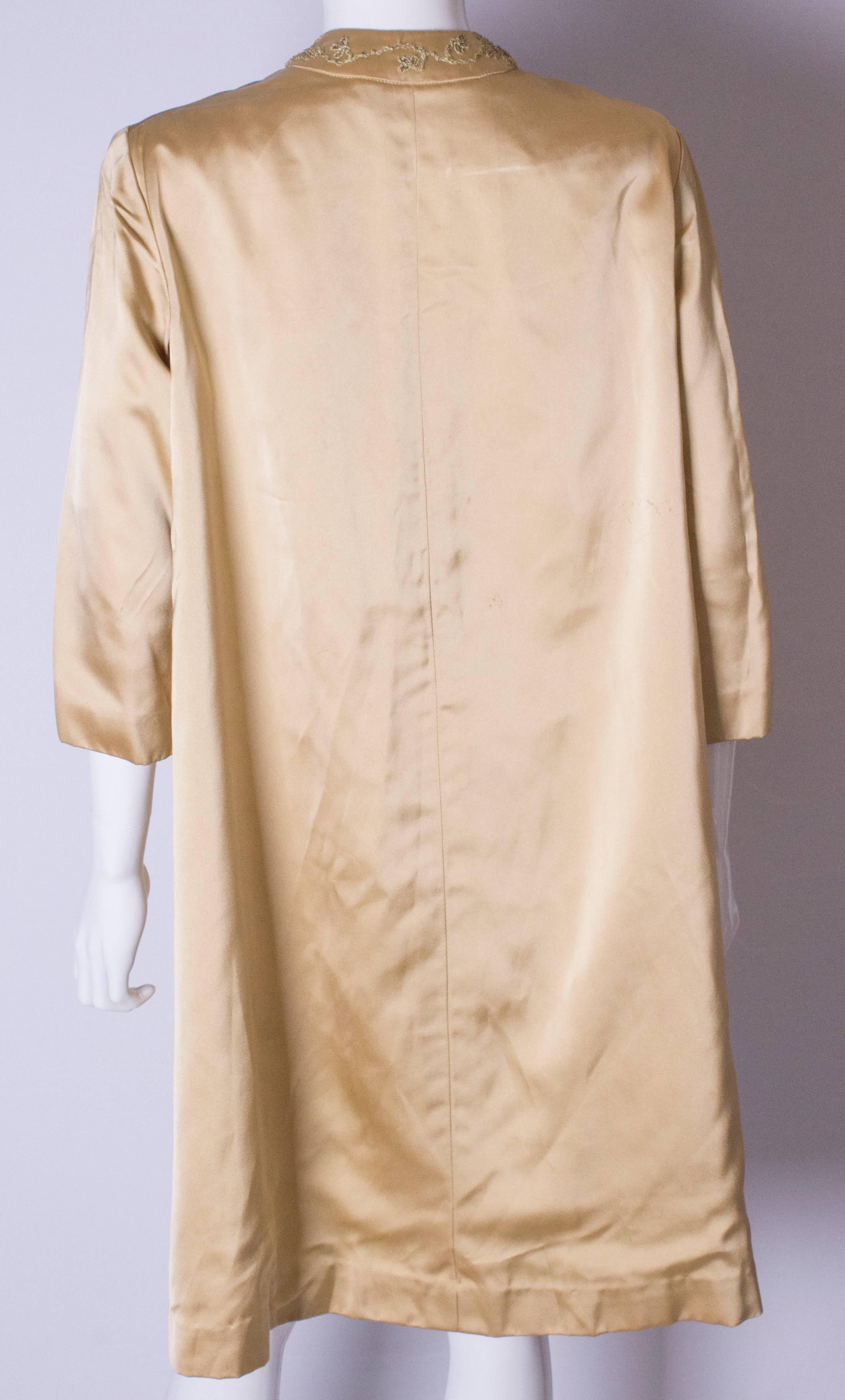 Women's A Vintage 1960s Gold Saint Duster Coat by Carnegie For Sale