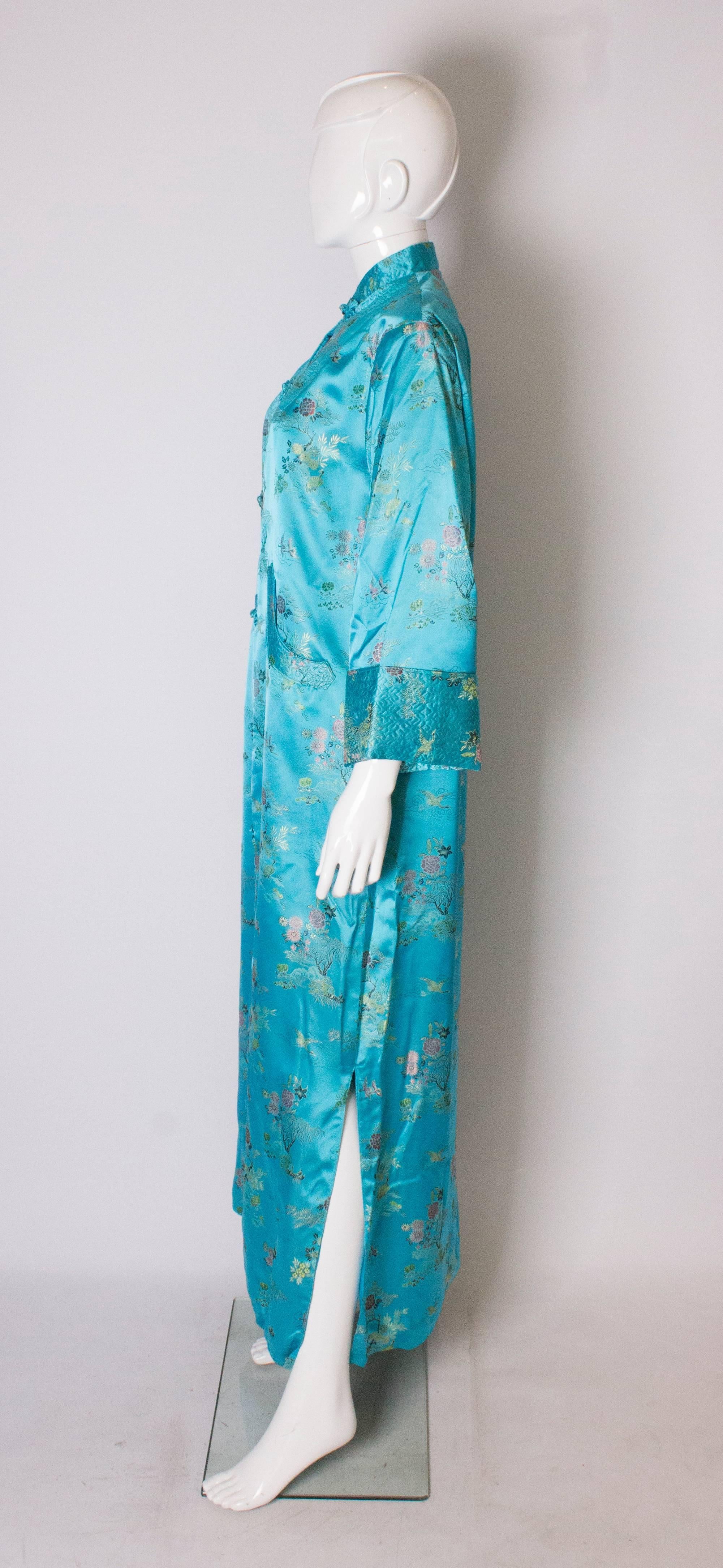 A 1960s Vintage Turquoise chinese satin embroidered evening Coat In Good Condition In London, GB