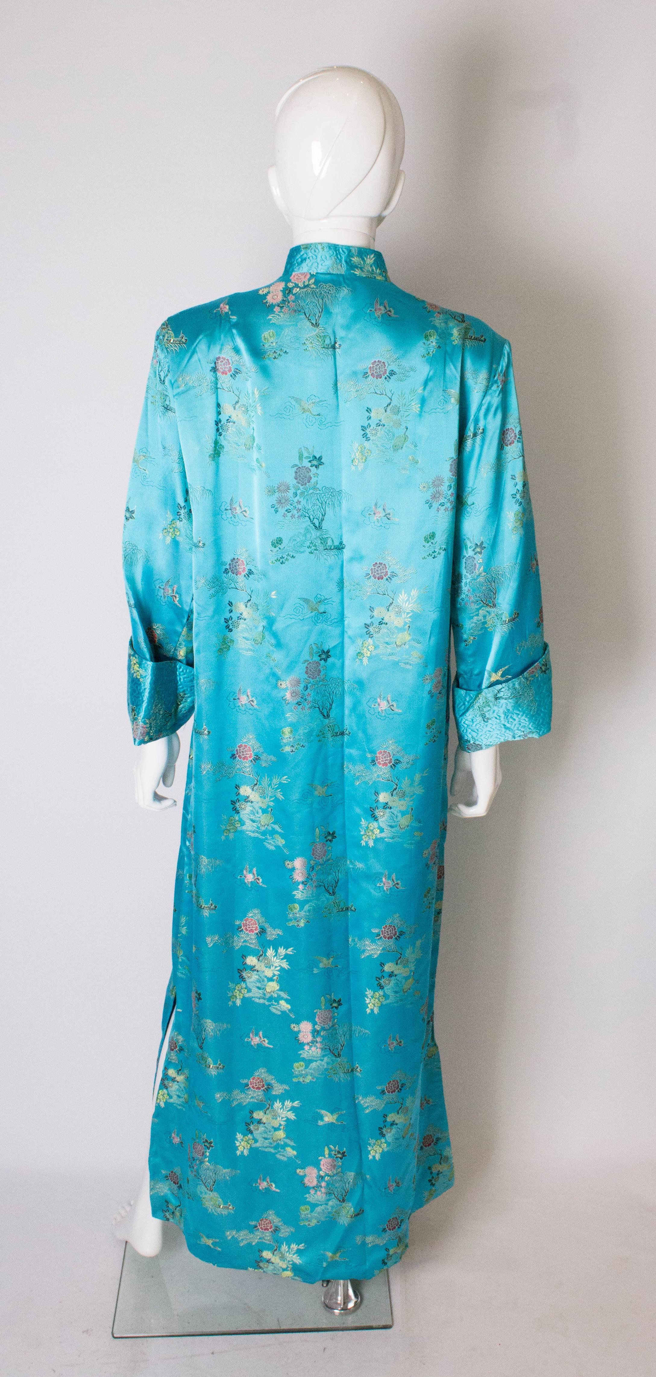 A 1960s Vintage Turquoise chinese satin embroidered evening Coat 1