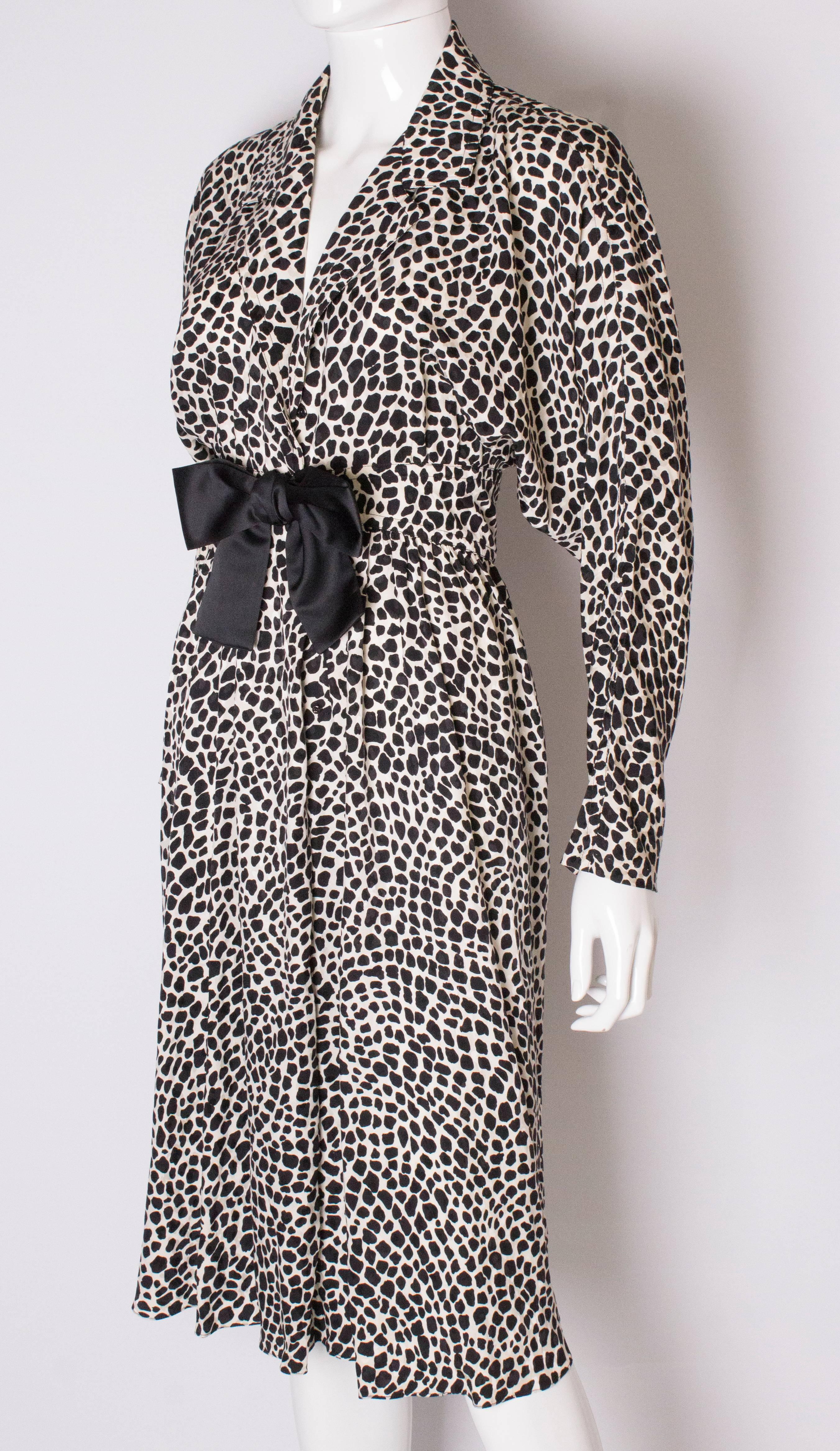 Women's or Men's A Vintage 1980s Black and White printed Dress with bow detail by Adele Simpson
