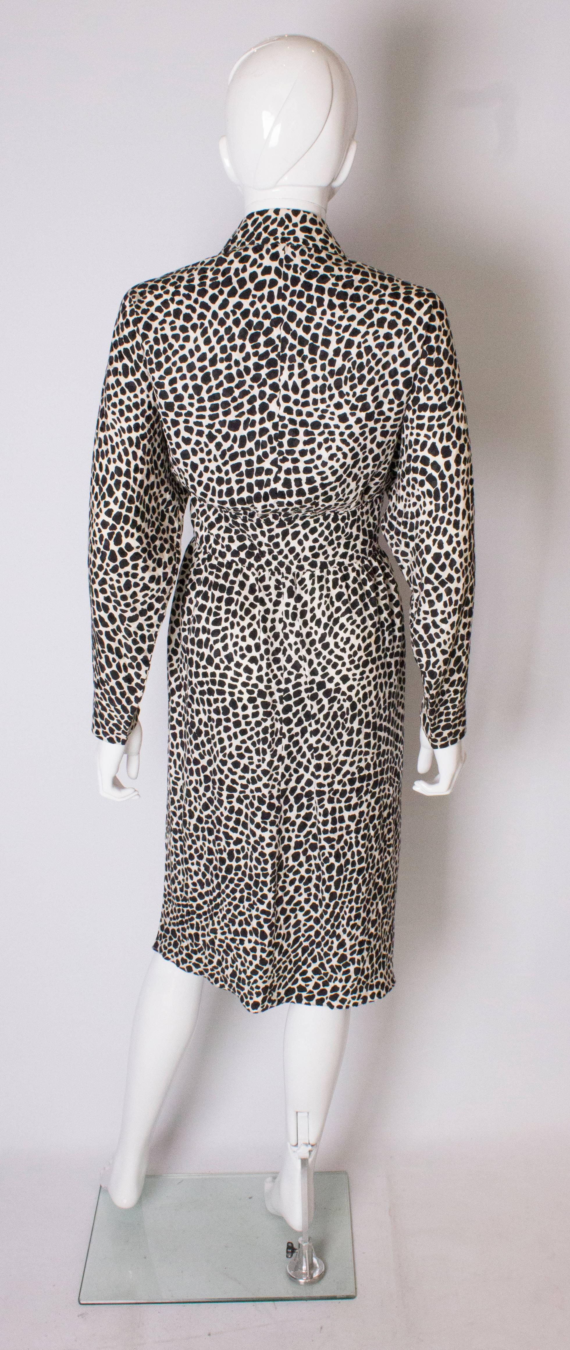 A Vintage 1980s Black and White printed Dress with bow detail by Adele Simpson 3