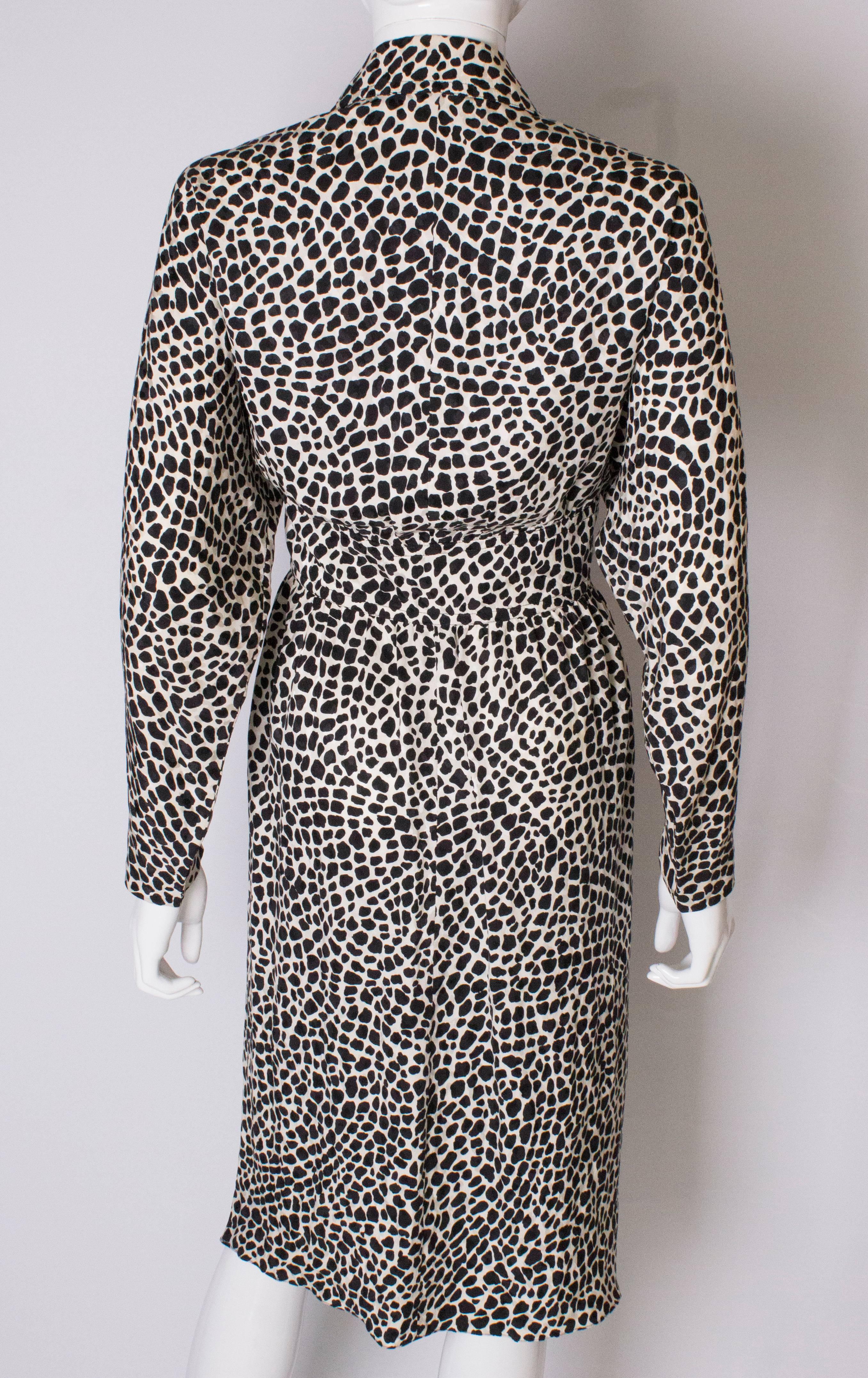 A Vintage 1980s Black and White printed Dress with bow detail by Adele Simpson 4