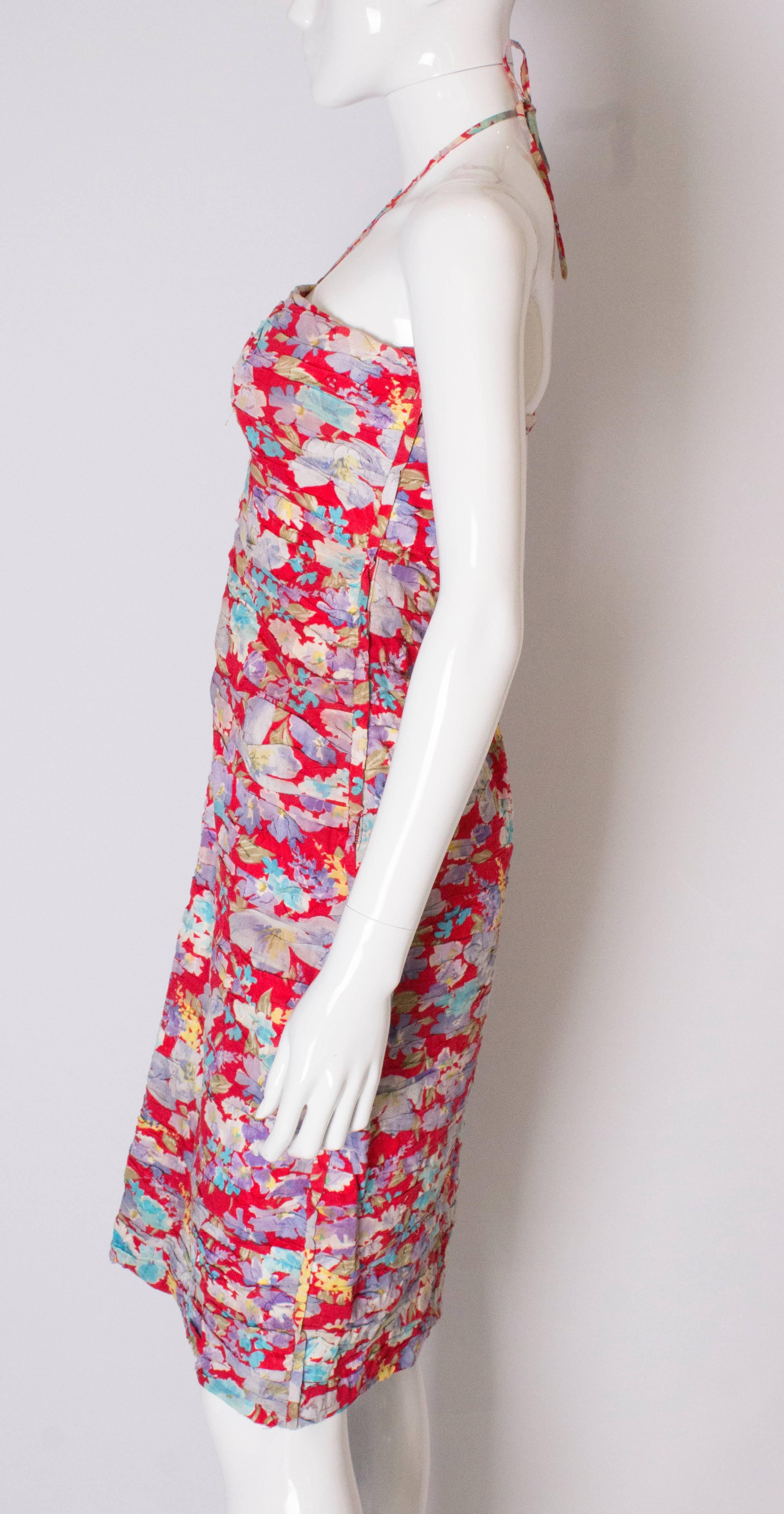 A 1980s Vintage Red Floral wiggle Sundress with halterneck detail  In Good Condition For Sale In London, GB