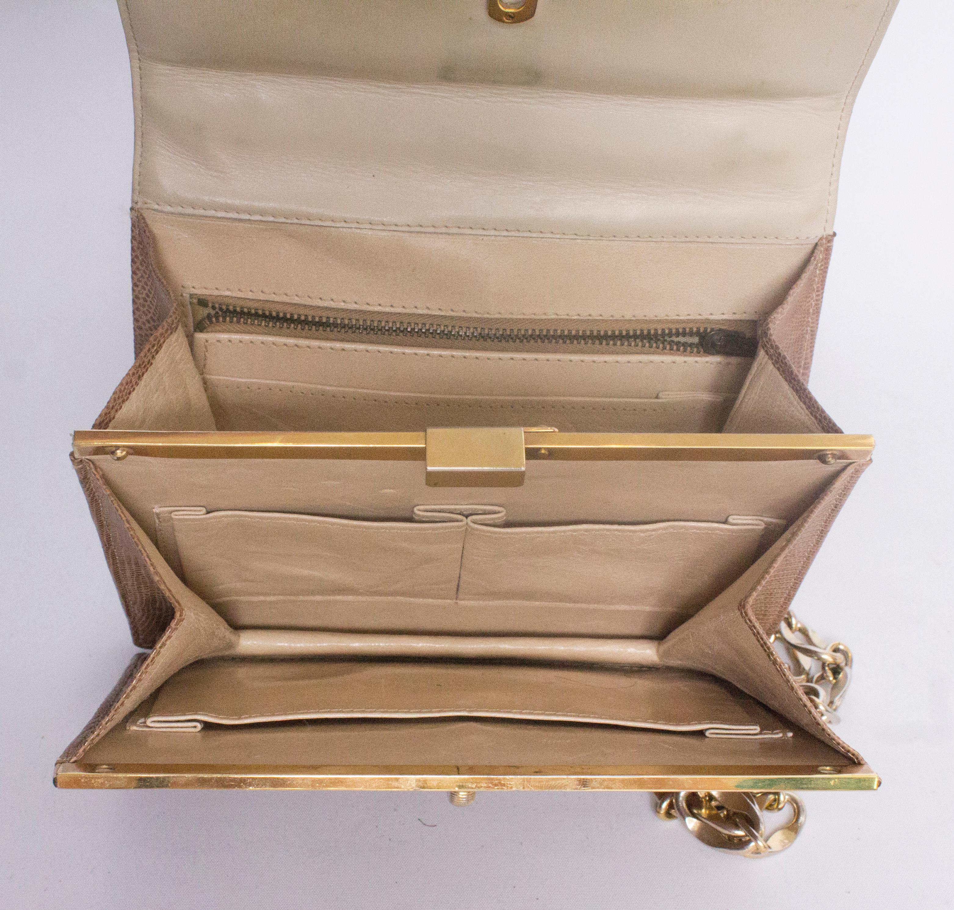 A Vintage 1970s Lizzard Handbag with a Gold Chain 1