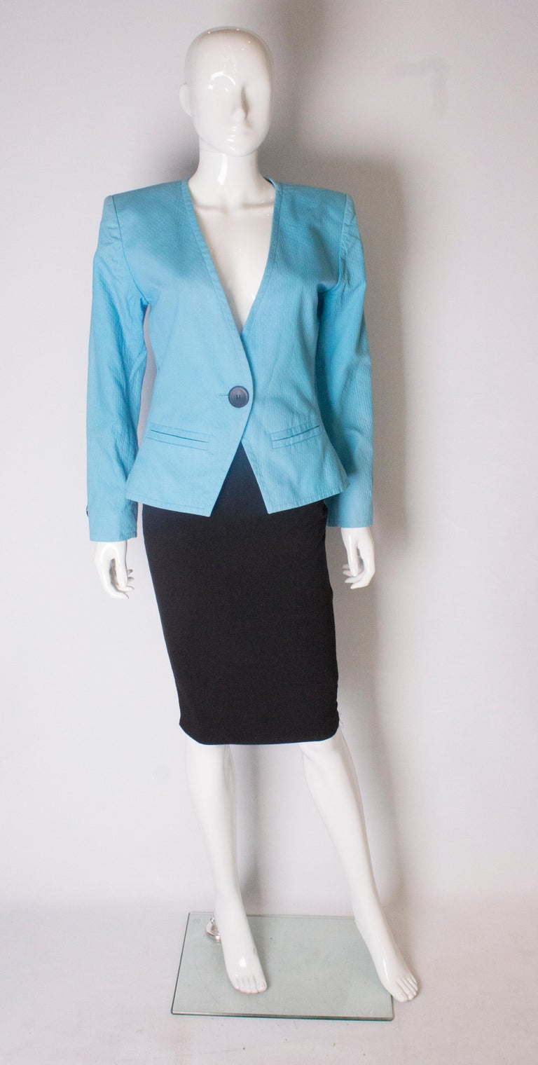 A Vintage 1980s pale blue cotton jacket by Yves Saint Laurent at 1stDibs
