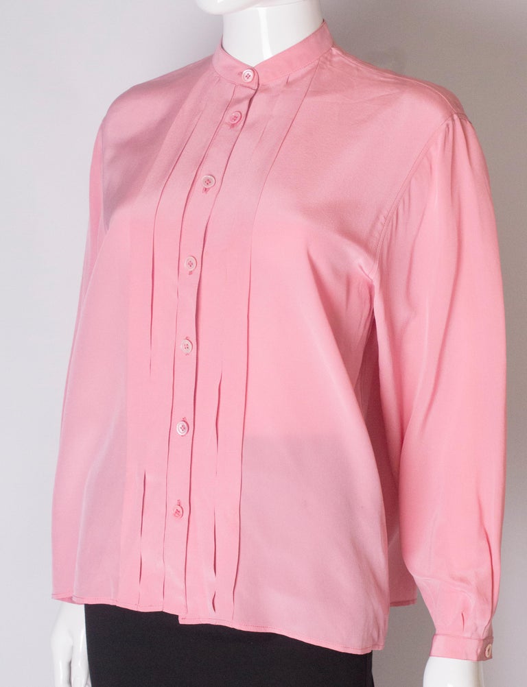 A Vintage 1990s pale pink silk button up blouse by Yves Saint Laurent ...