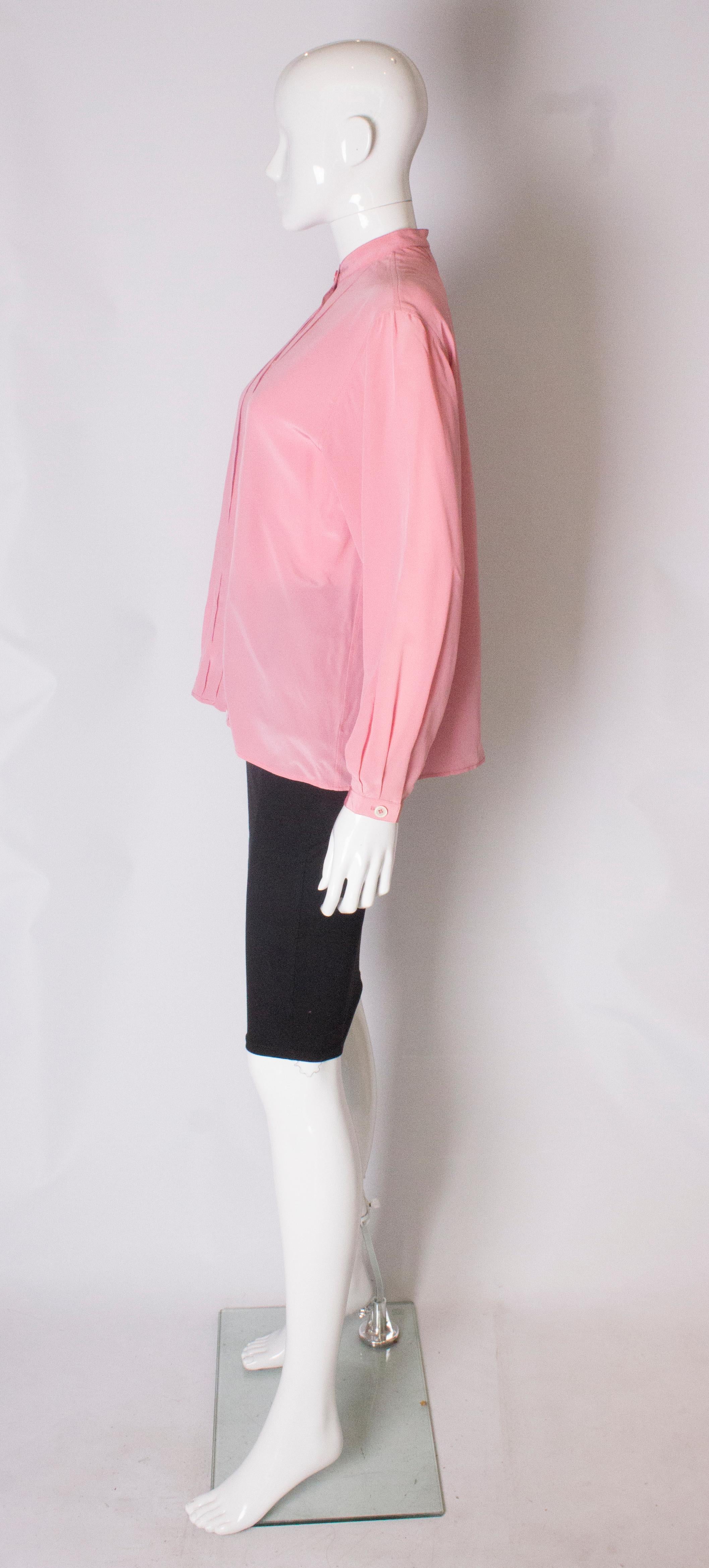 A Vintage 1990s pale pink silk button up blouse by Yves Saint Laurent  In Good Condition In London, GB
