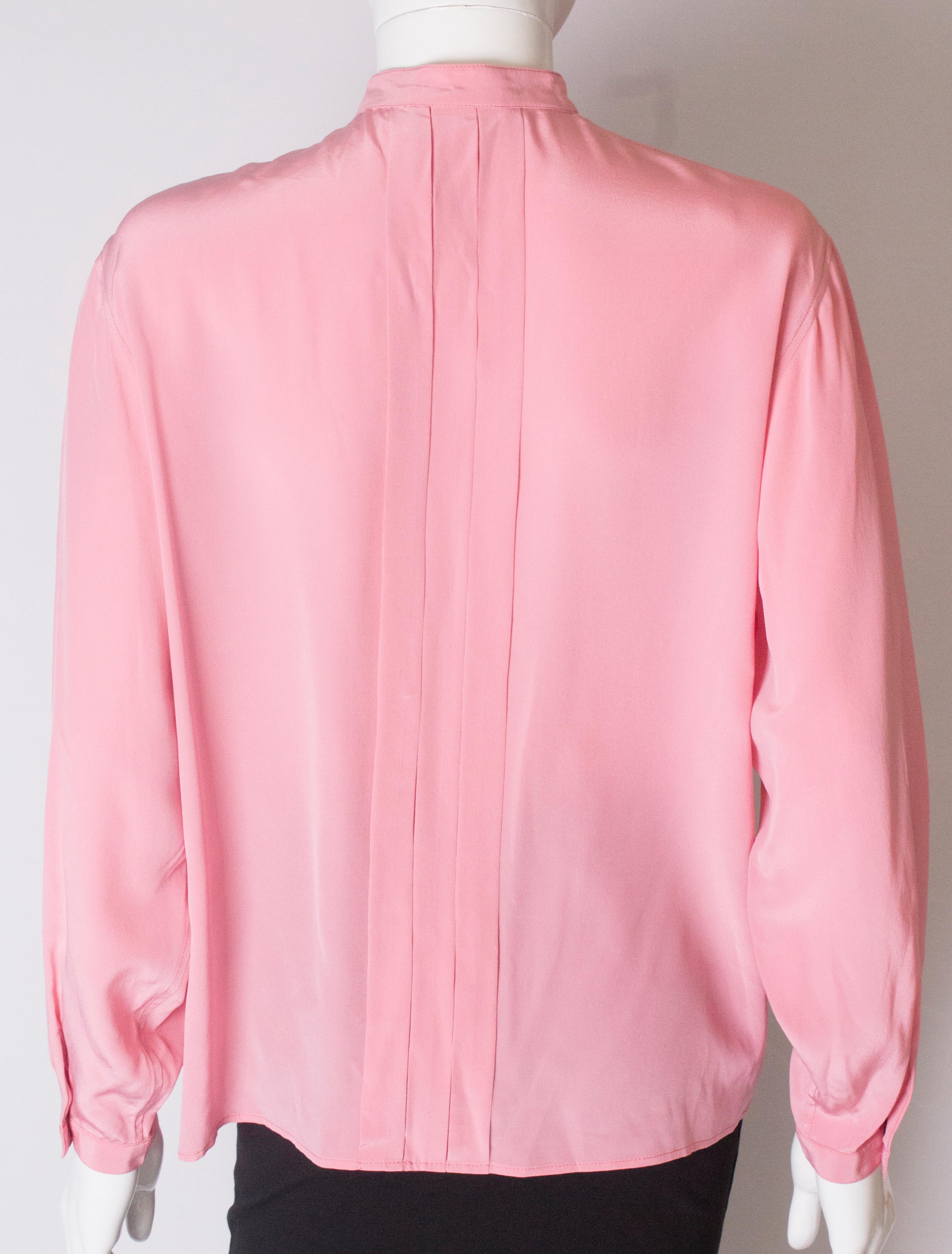 A Vintage 1990s pale pink silk button up blouse by Yves Saint Laurent  2