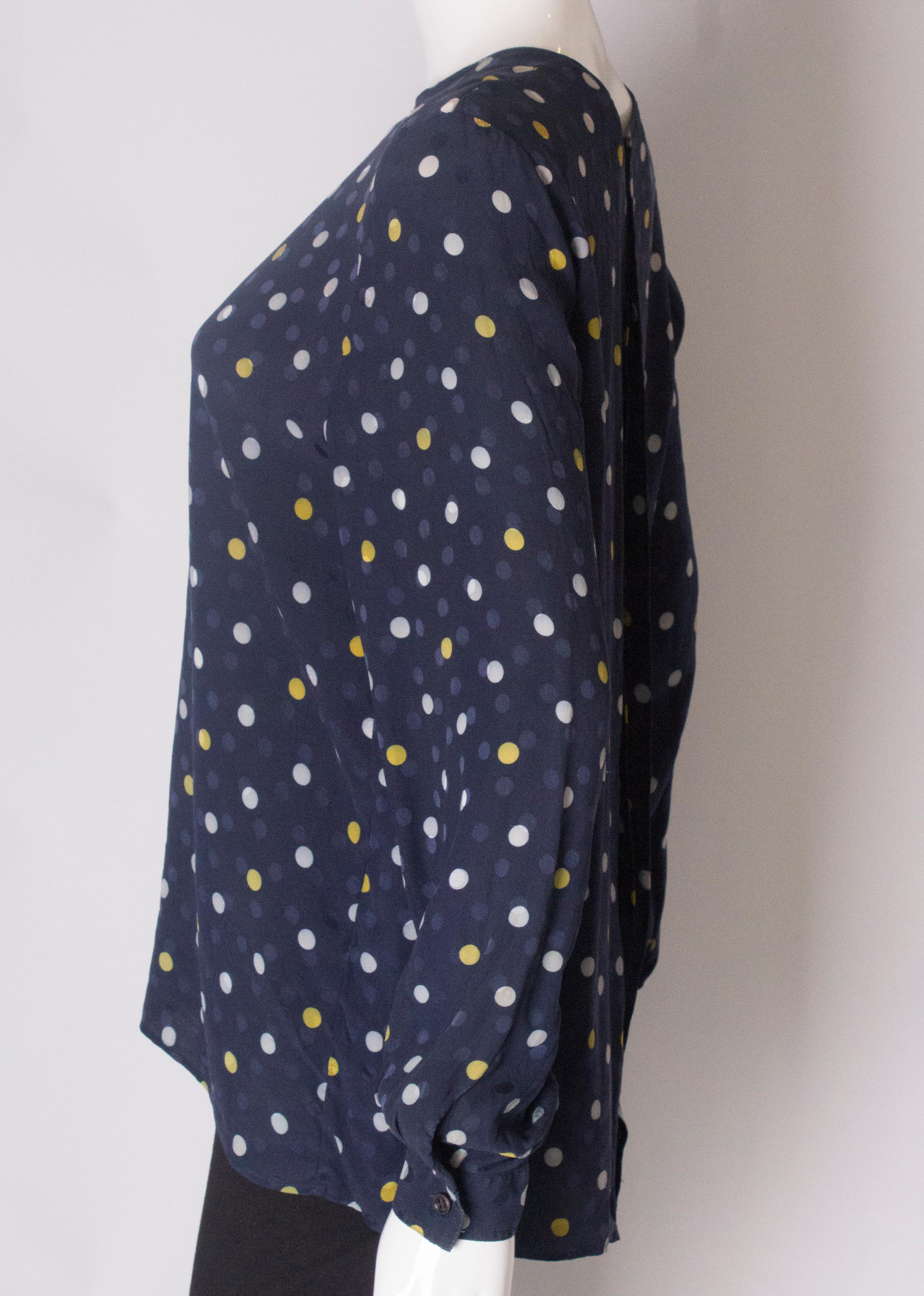 A Vintage 1990s navy polka dot silk blouse by Valentino  For Sale 1