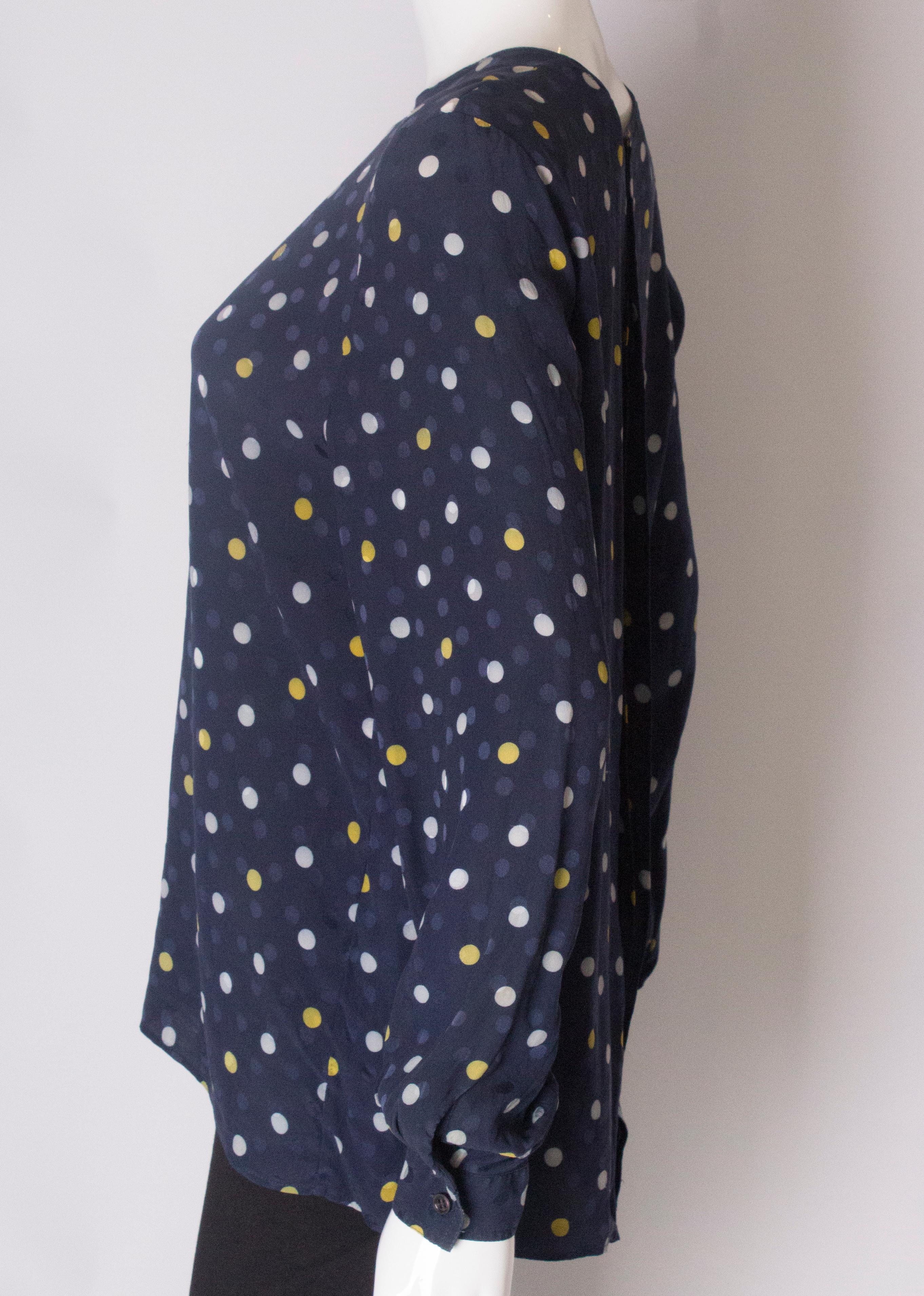A Vintage 1990s navy polka dot silk blouse by Valentino For Sale 1