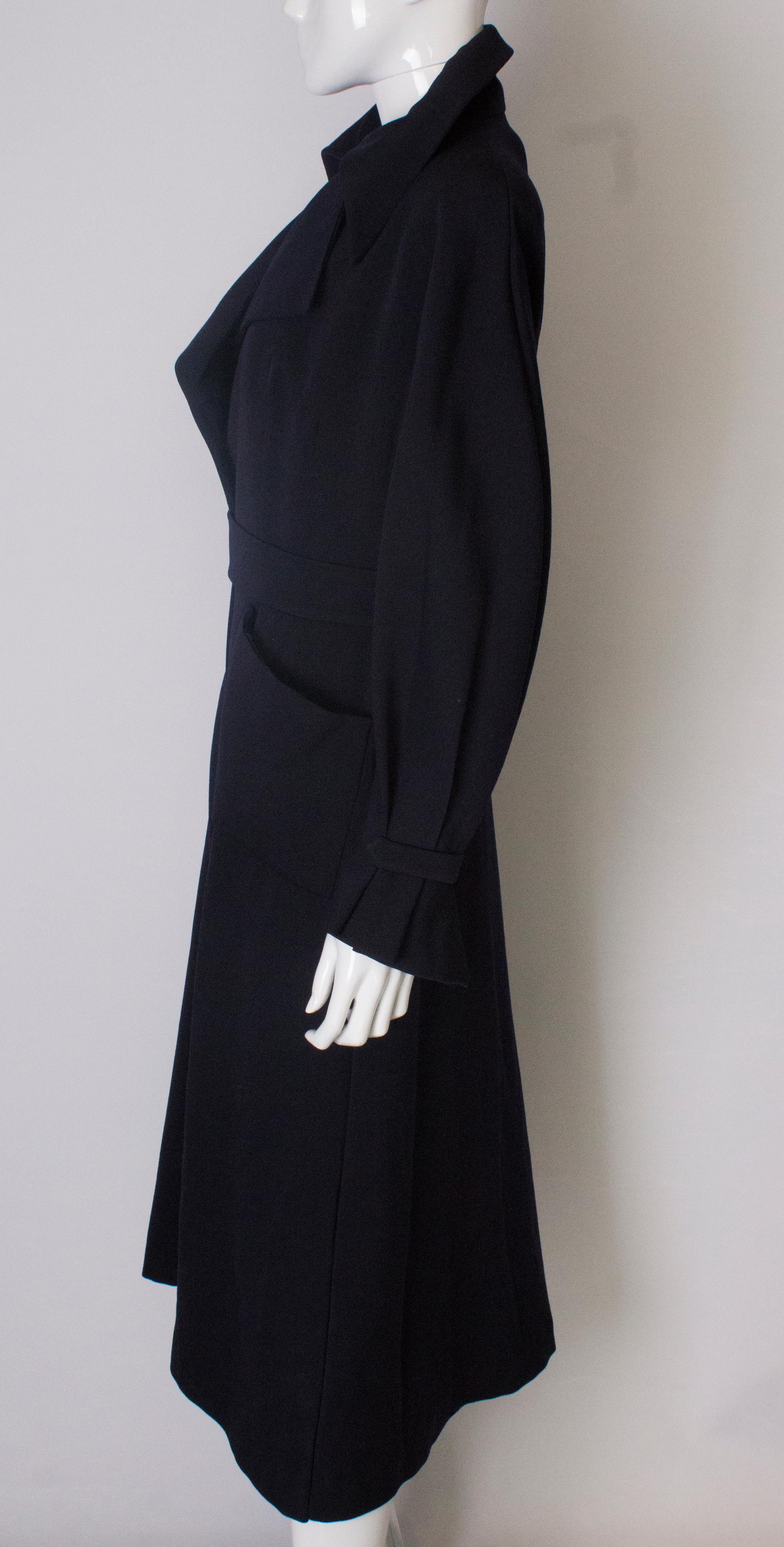 A Vintage 1950s dark navy tailored Coat by Simon Massey 1