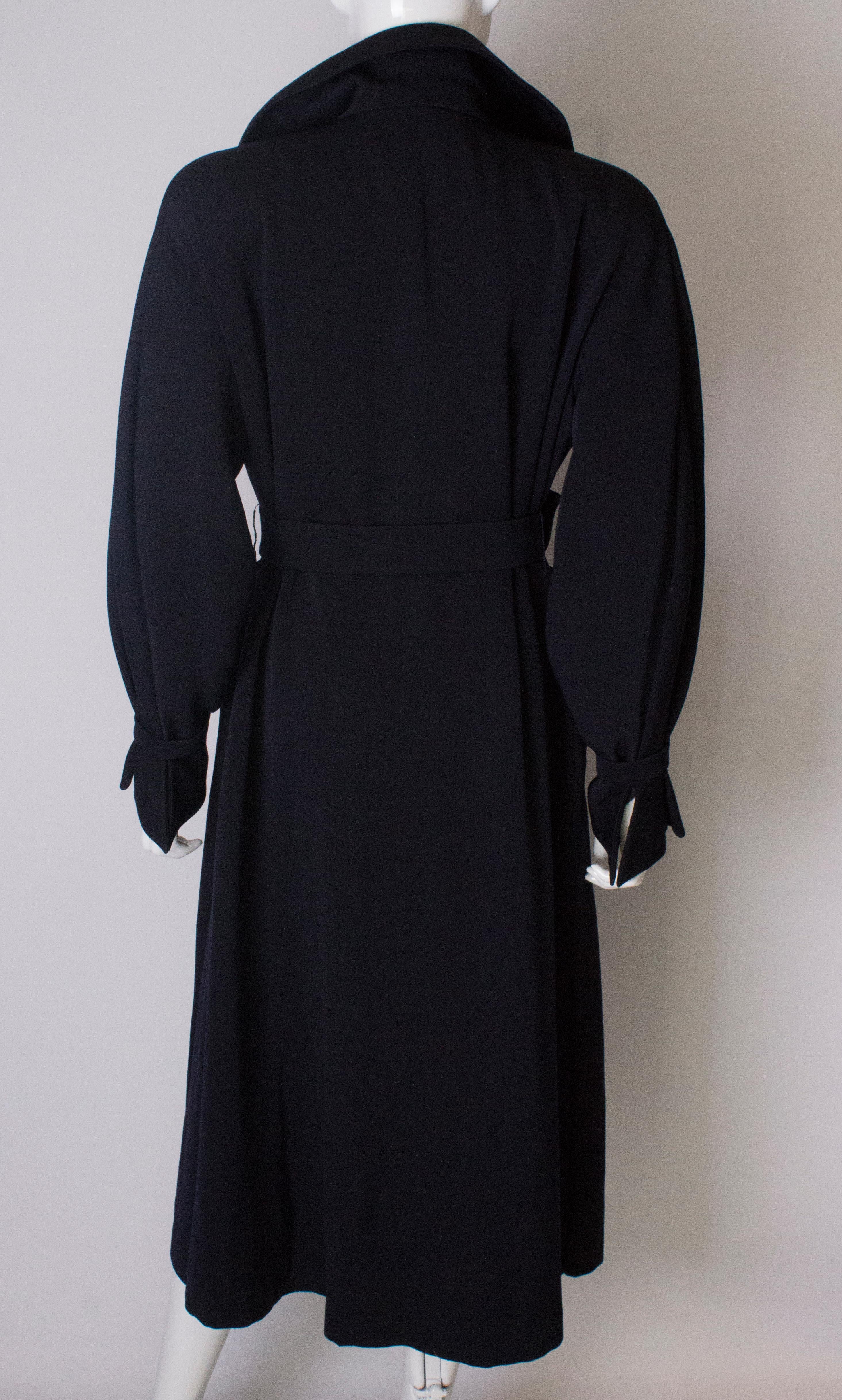 A Vintage 1950s dark navy tailored Coat by Simon Massey 3