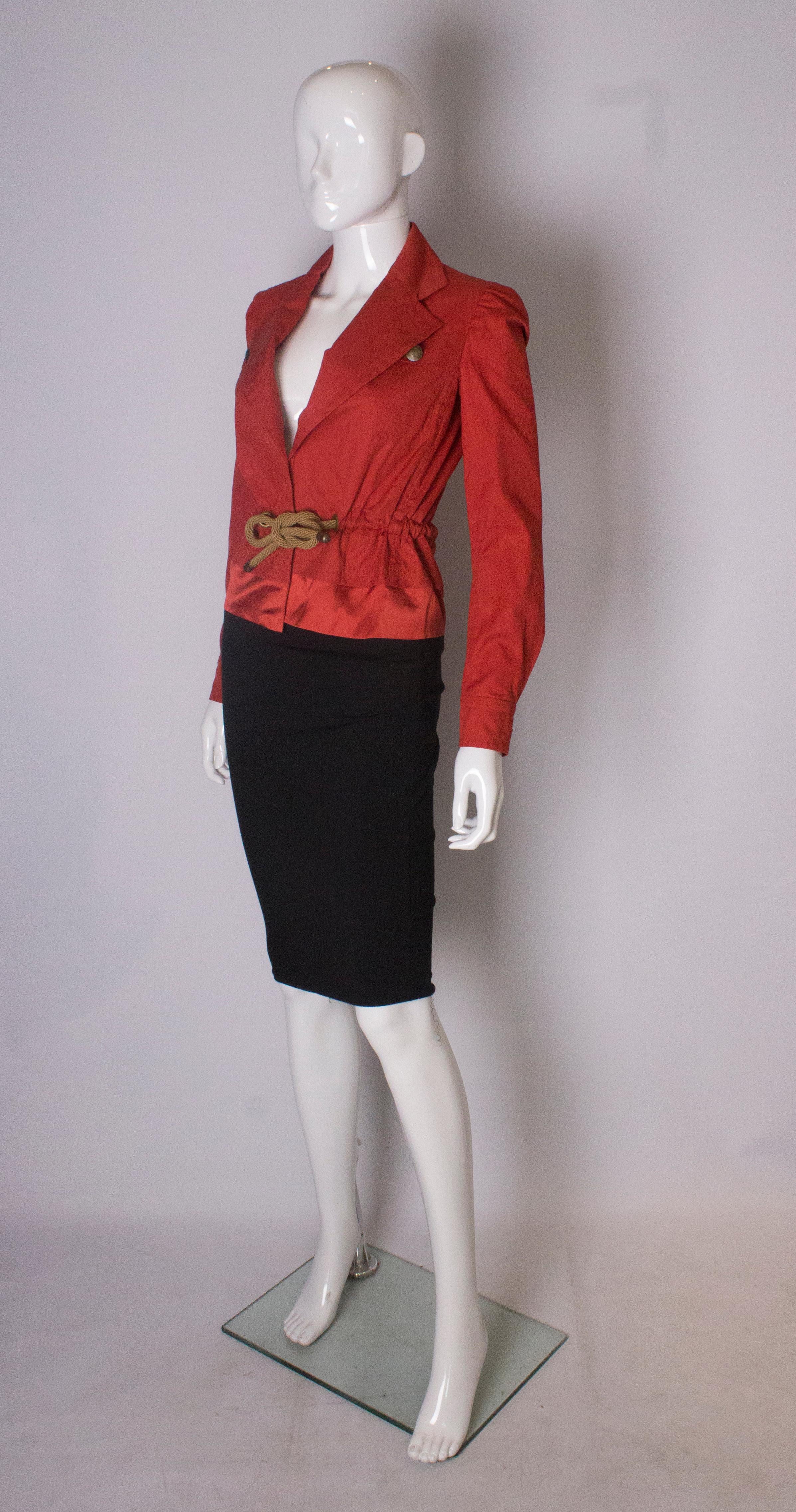 Red A Vintage 2000 red belted jacket by Yves Saint Laurent 