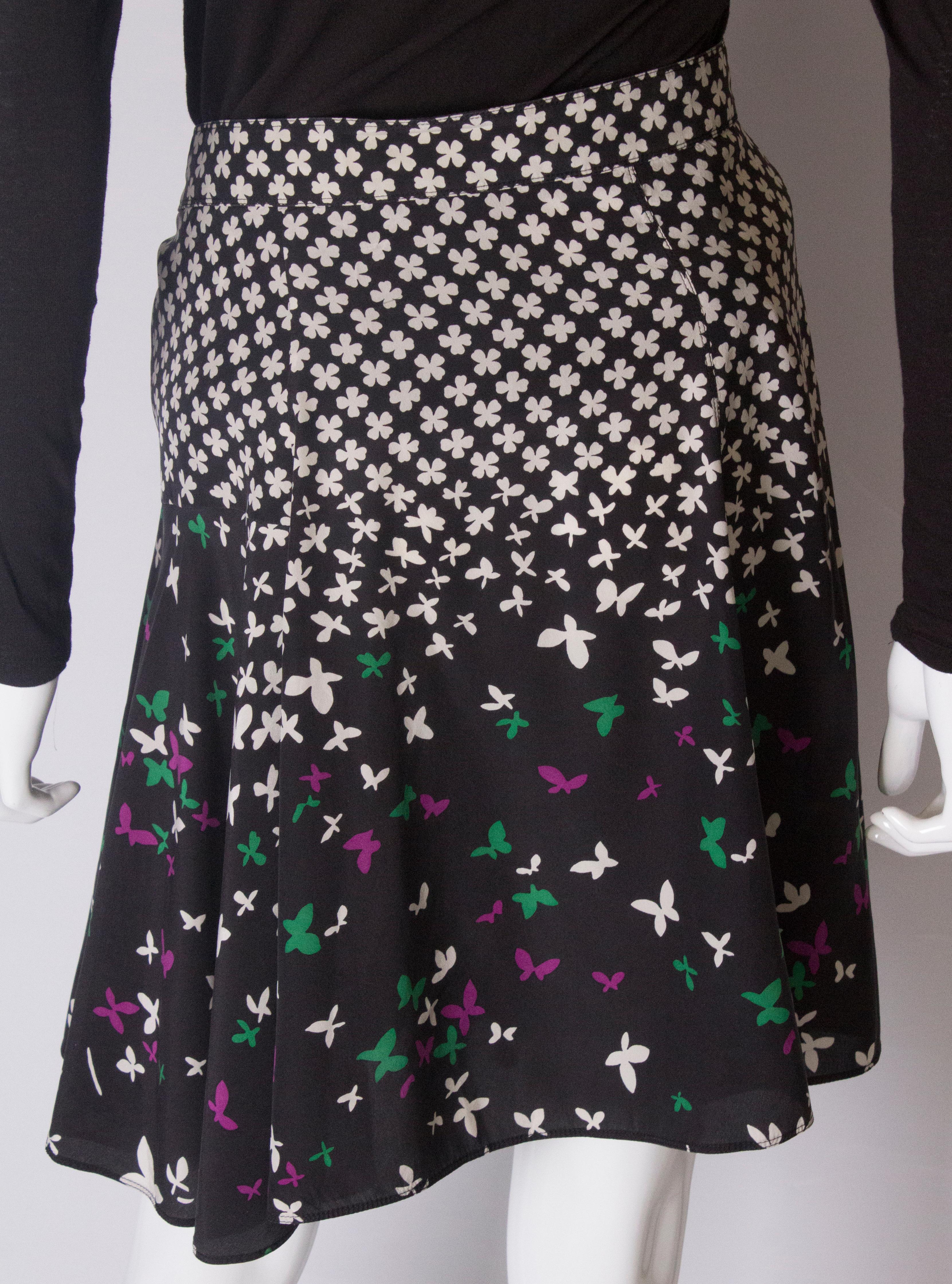 A vintage silk printed wrap over mini skirt by Yves Saint Laurent 3