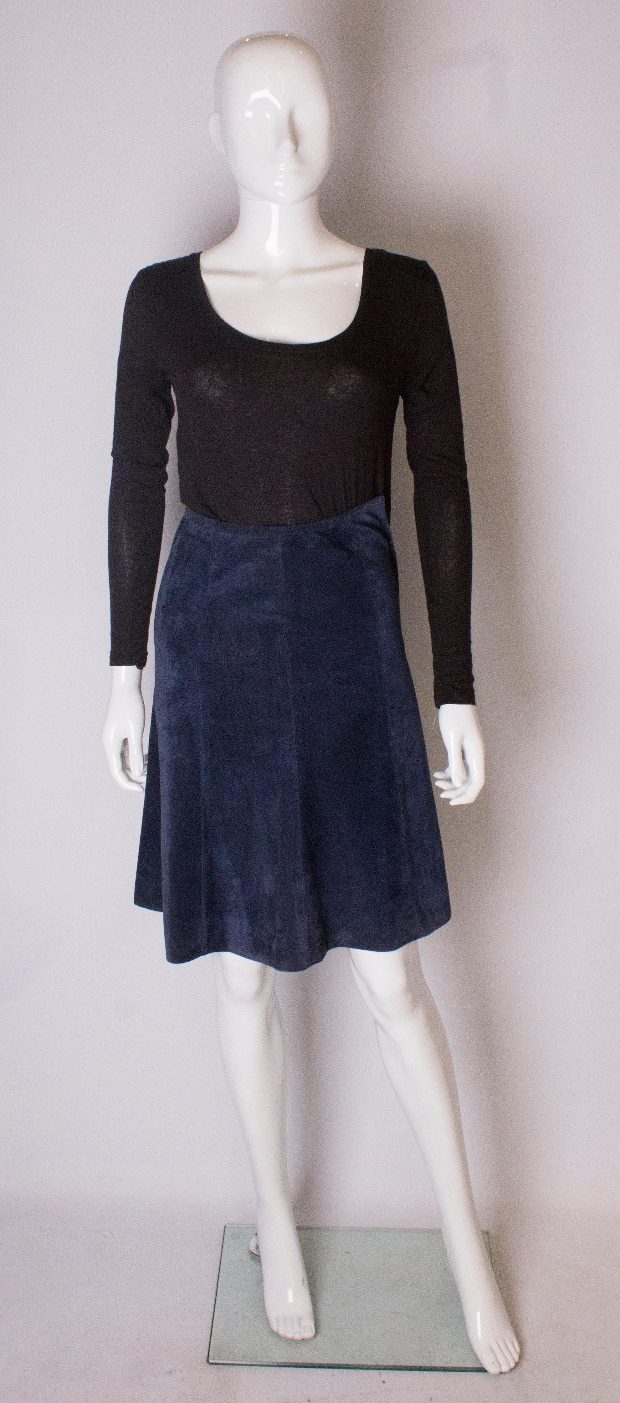 A chic blue suede skirt by Fortnum and Mason ,when they had one of the best fashion departments in London.
The skirt is A line , panelled, fully lined with a side zip.