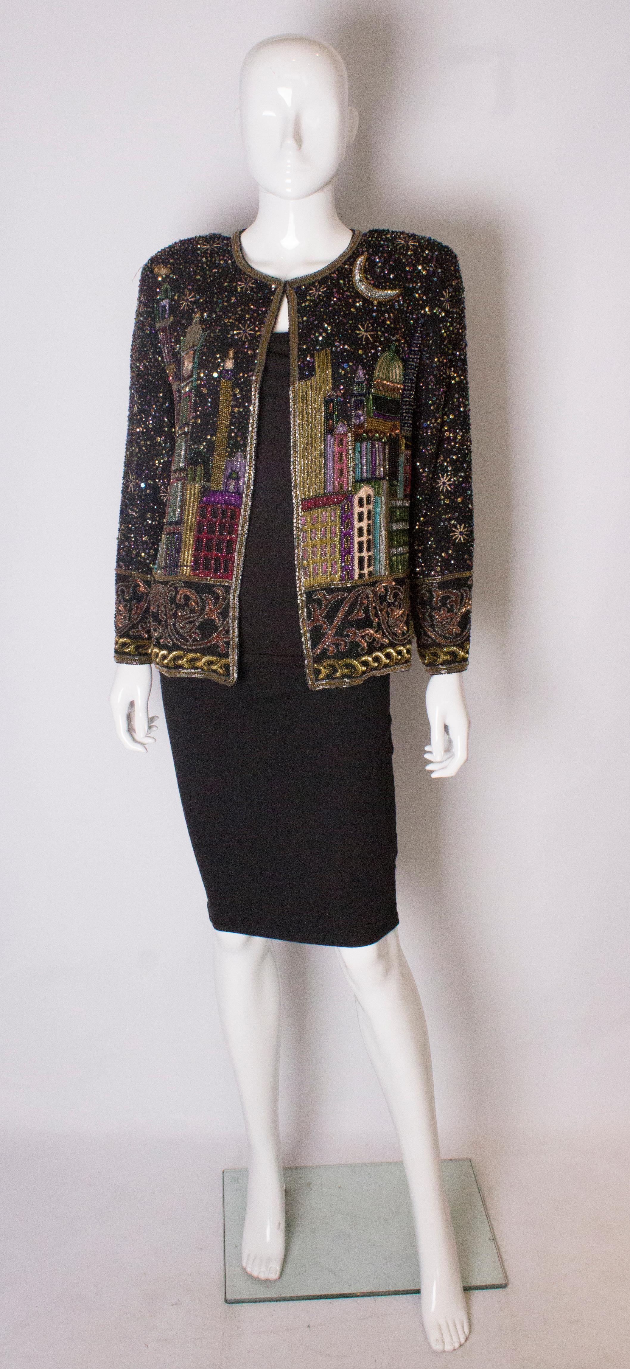  A stunning beaded jacket ,decorated with the famous sites of London. The craftsmanship is superb and the 'sites' include Big Ben, The Tower of London, and Tower Bridge. The jacket fastens with one hook and eye, and has a decorative border around