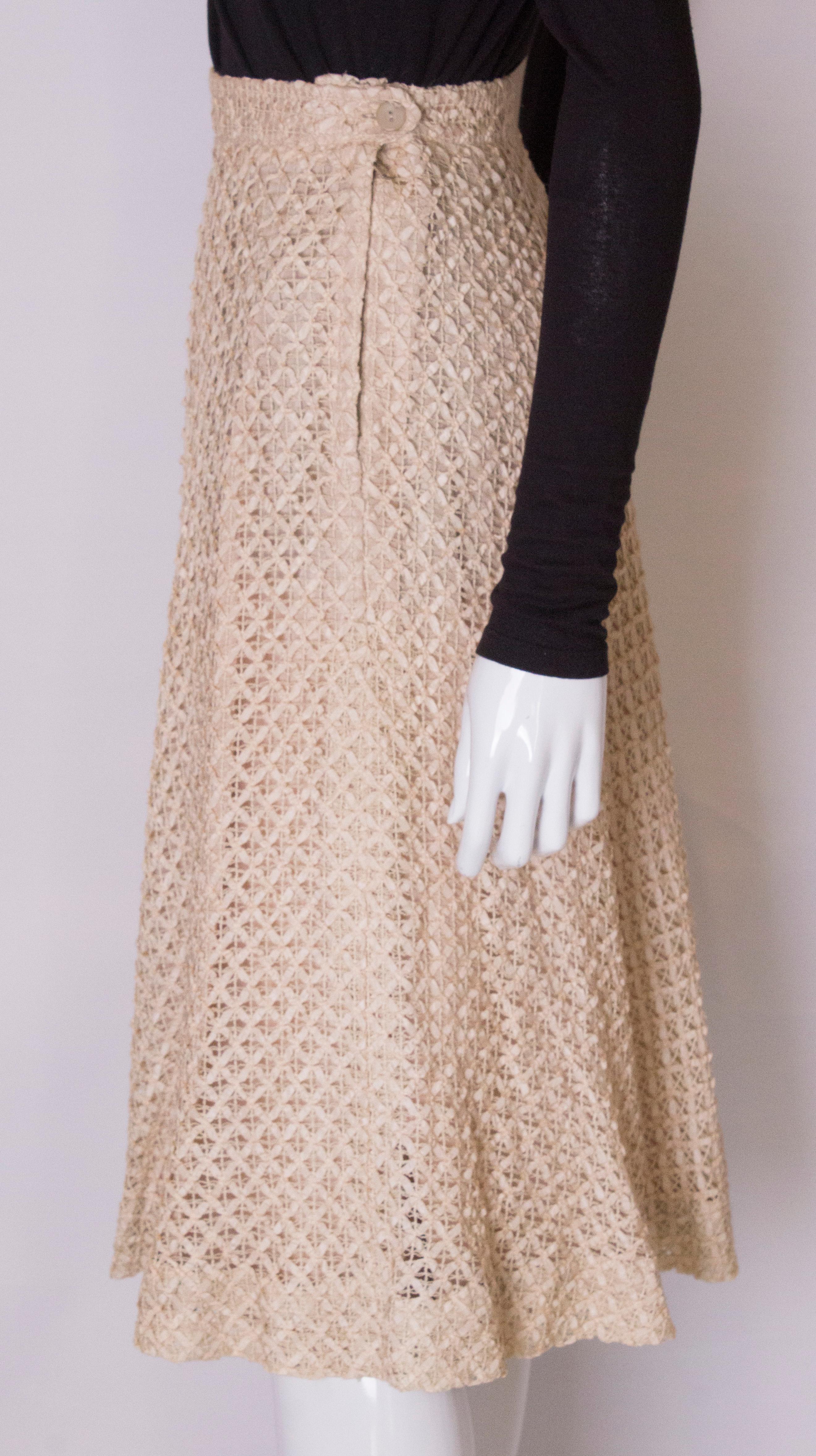 A vintage 1950s cream ribbon woven swing skirt  1