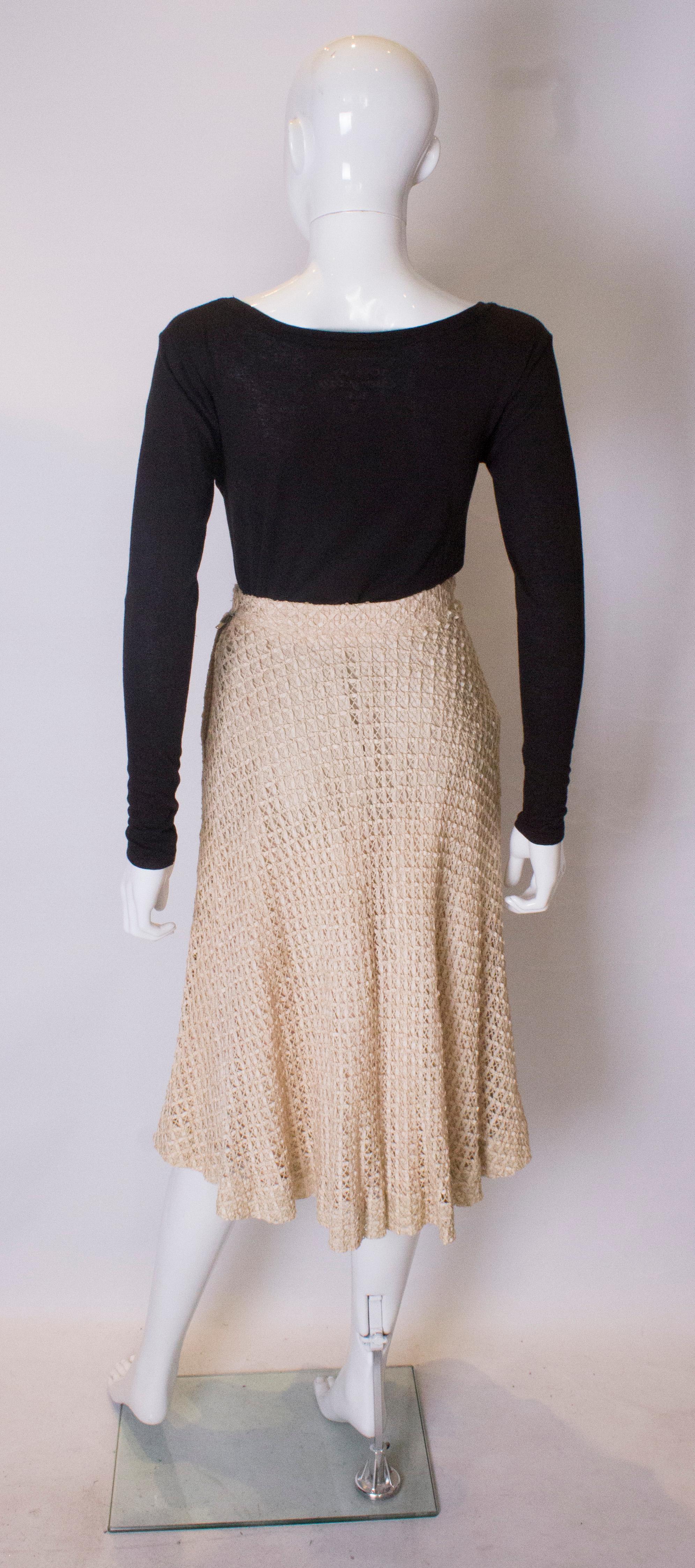 A vintage 1950s cream ribbon woven swing skirt  2