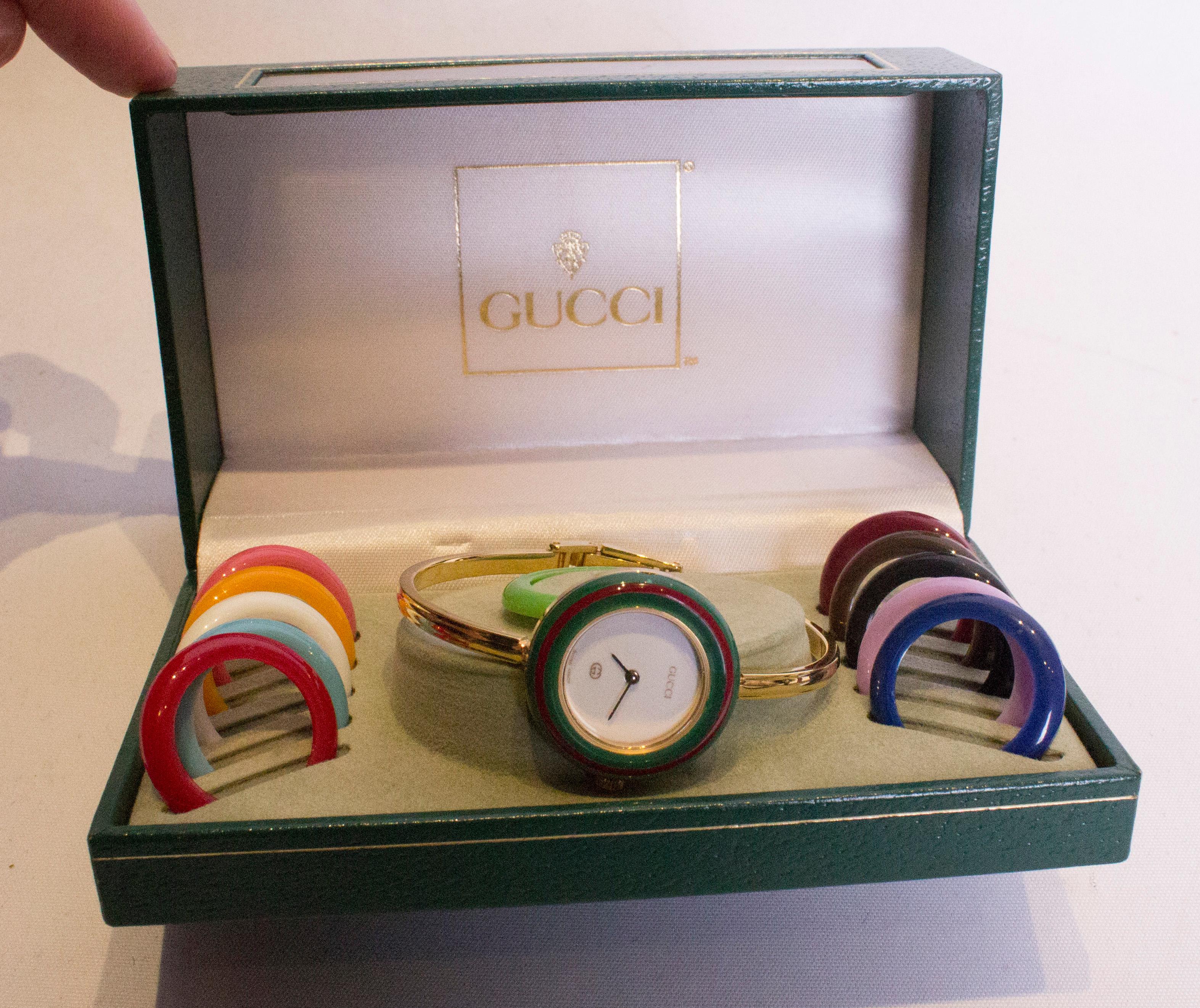A great vintage watch by Gucci. This elegant and easy to wear watch has 12 colour options for the frame and so can match any outift. It is in excellent condition.