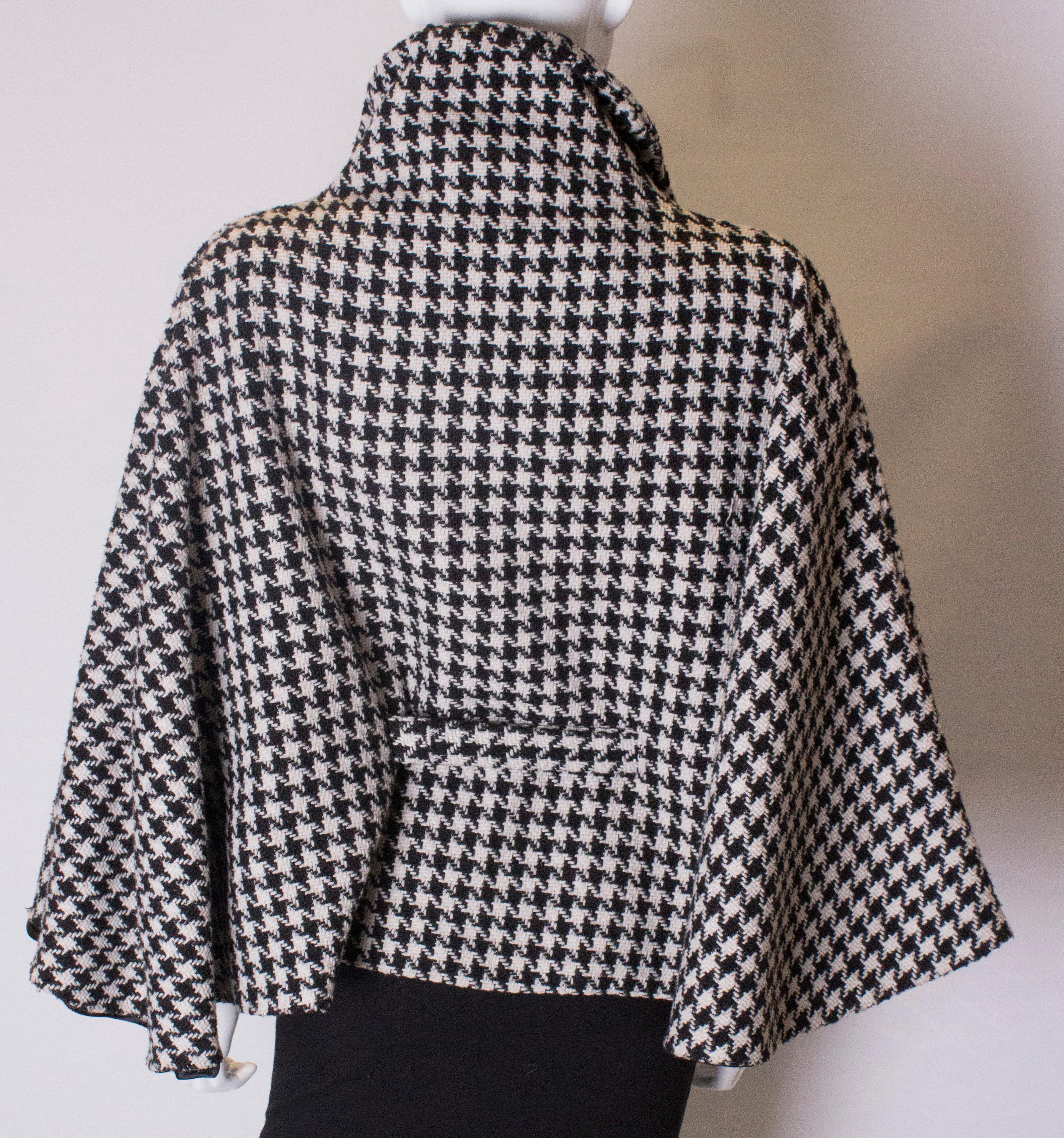 A Vintage 1970s Dents Black and White houndstooth Cape 2