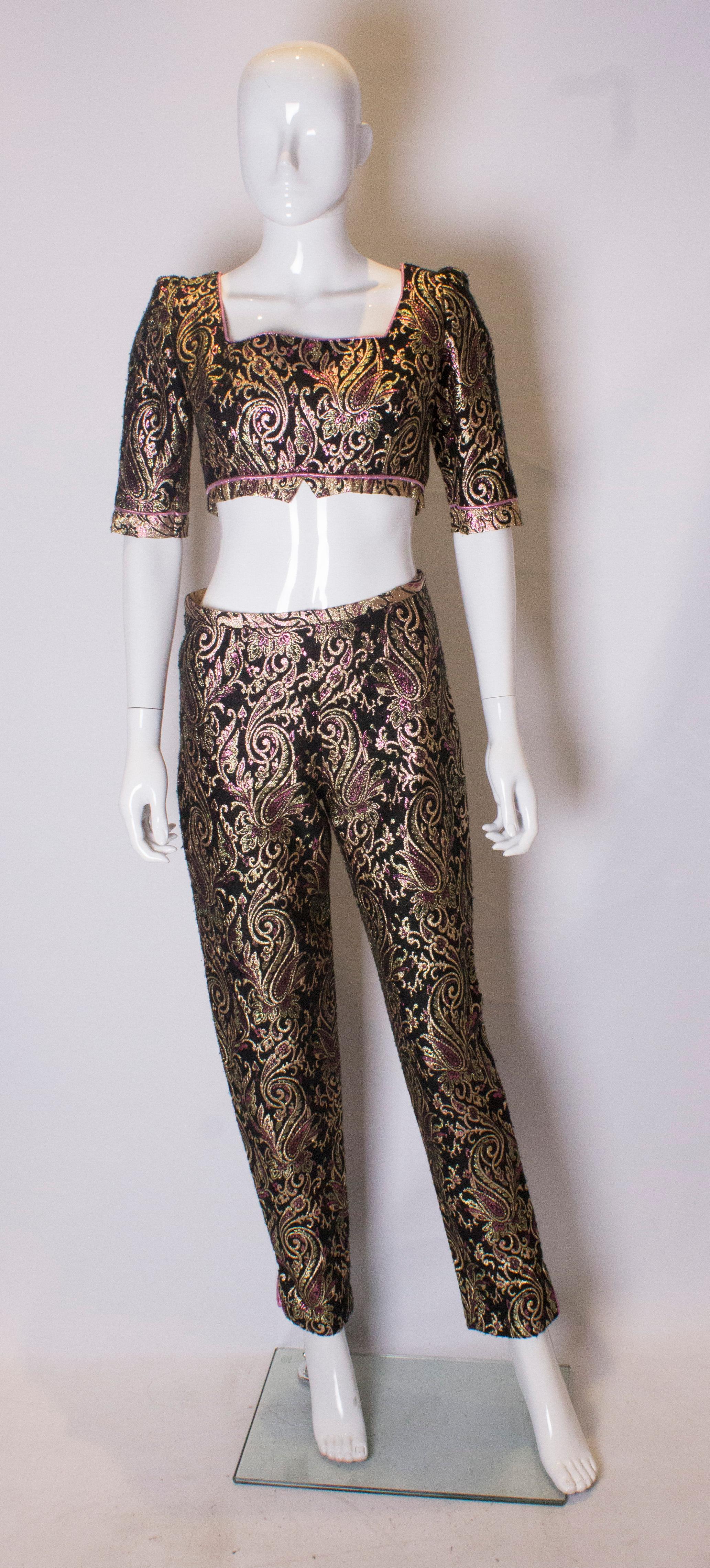 A great pair of vintage brocade trousers, perfect for the party season. They are fully lined with a central back zip.
Measurements: waist 29'', hips 38'', inside leg 31''