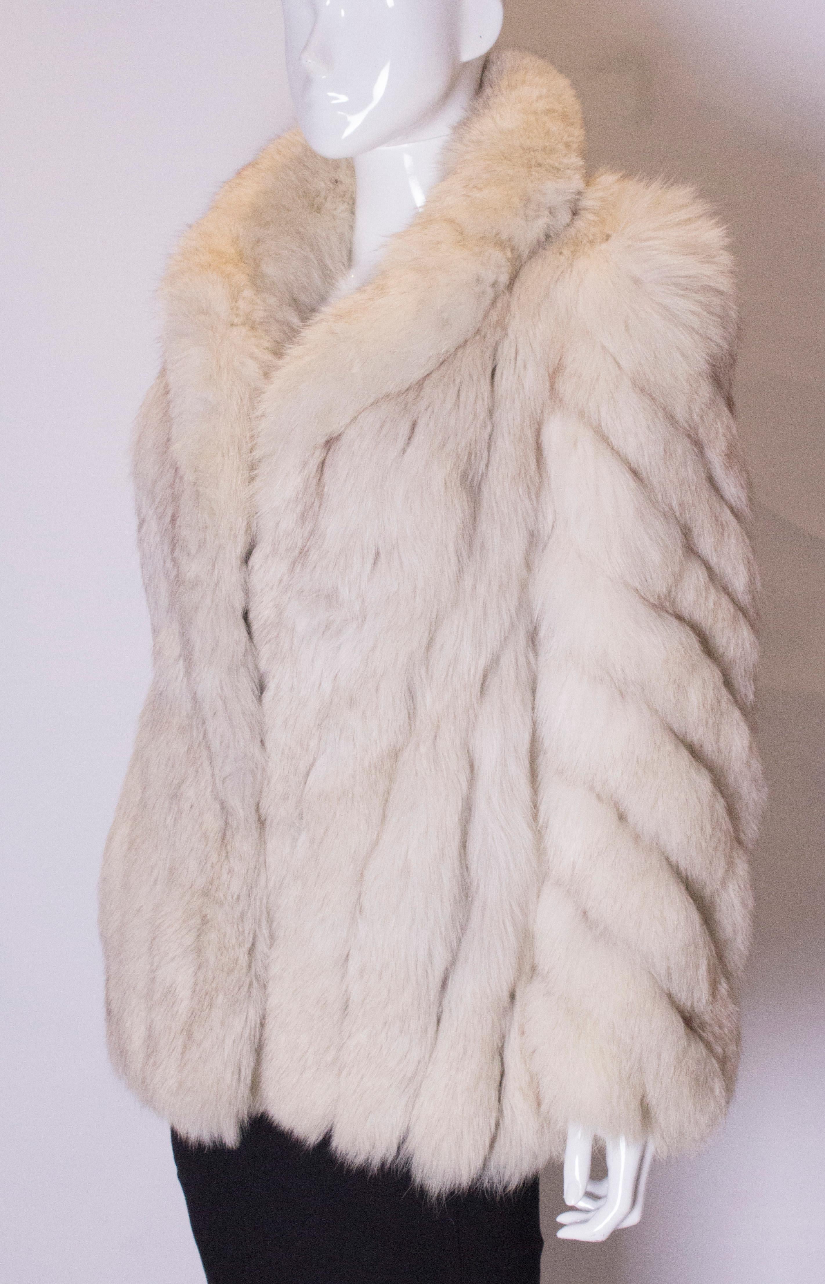 White A vintage 1970s artic white fox fur jacket winter coat
