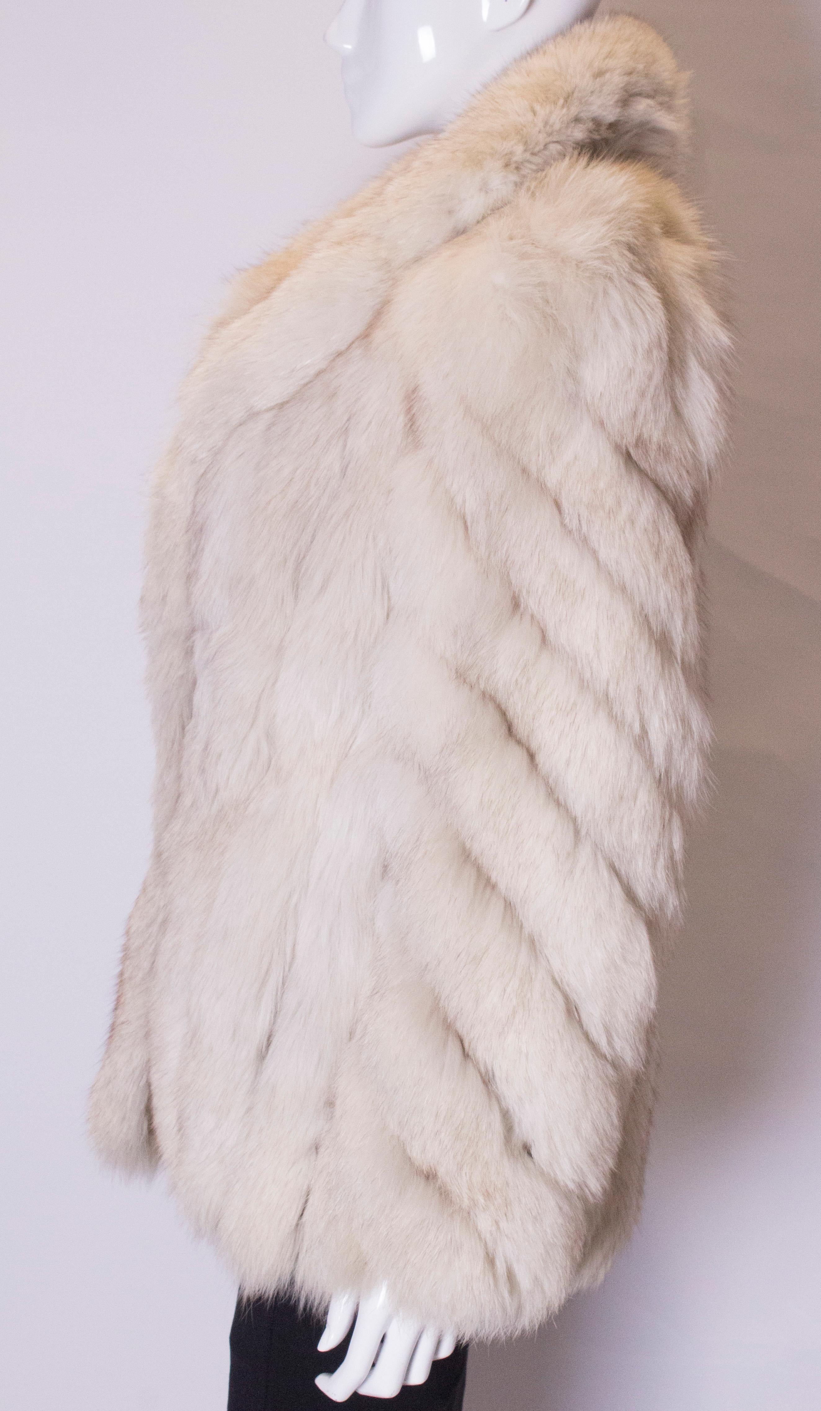 Women's or Men's A vintage 1970s artic white fox fur jacket winter coat