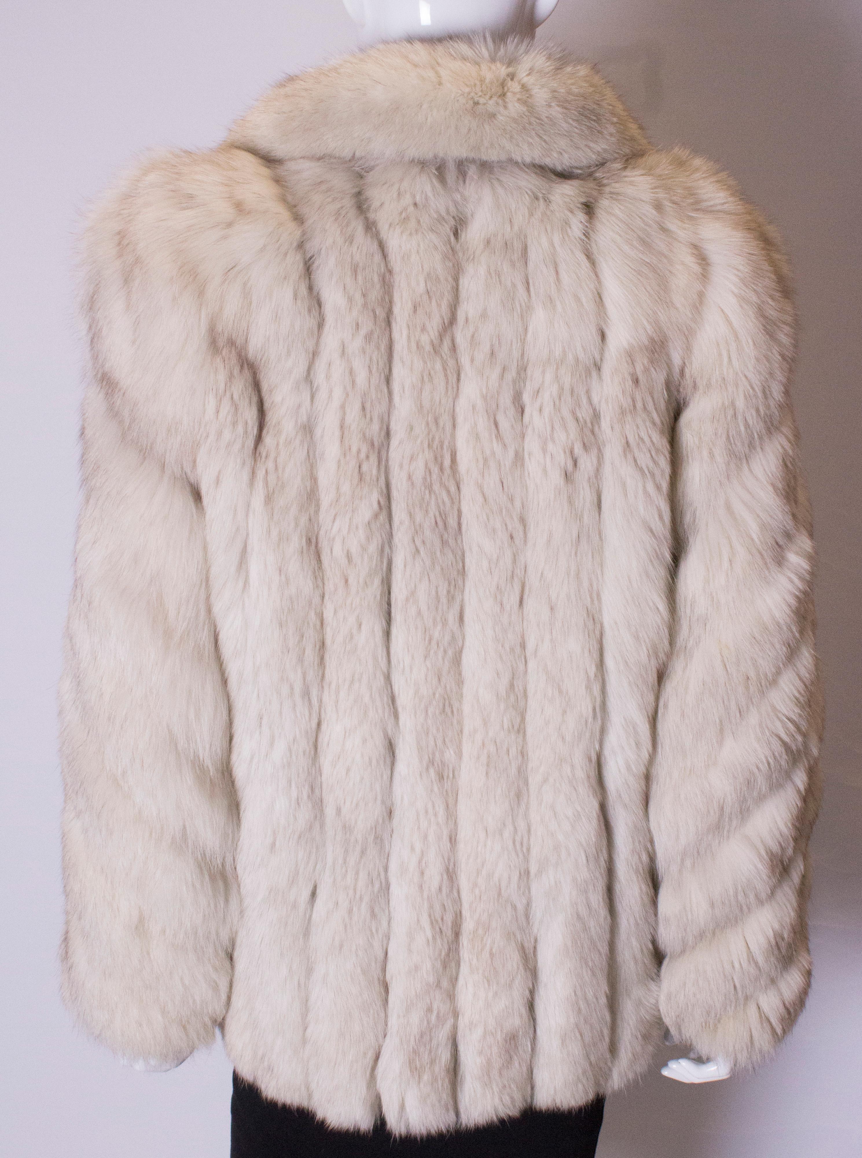 A vintage 1970s artic white fox fur jacket winter coat 2