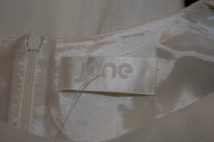 Top in crêpe bianco e nero di Jane of London