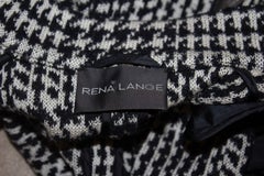 Chaqueta de lana negra y marfil de Rena Lange