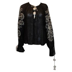 Black linen blouse with white embroidery by March 11