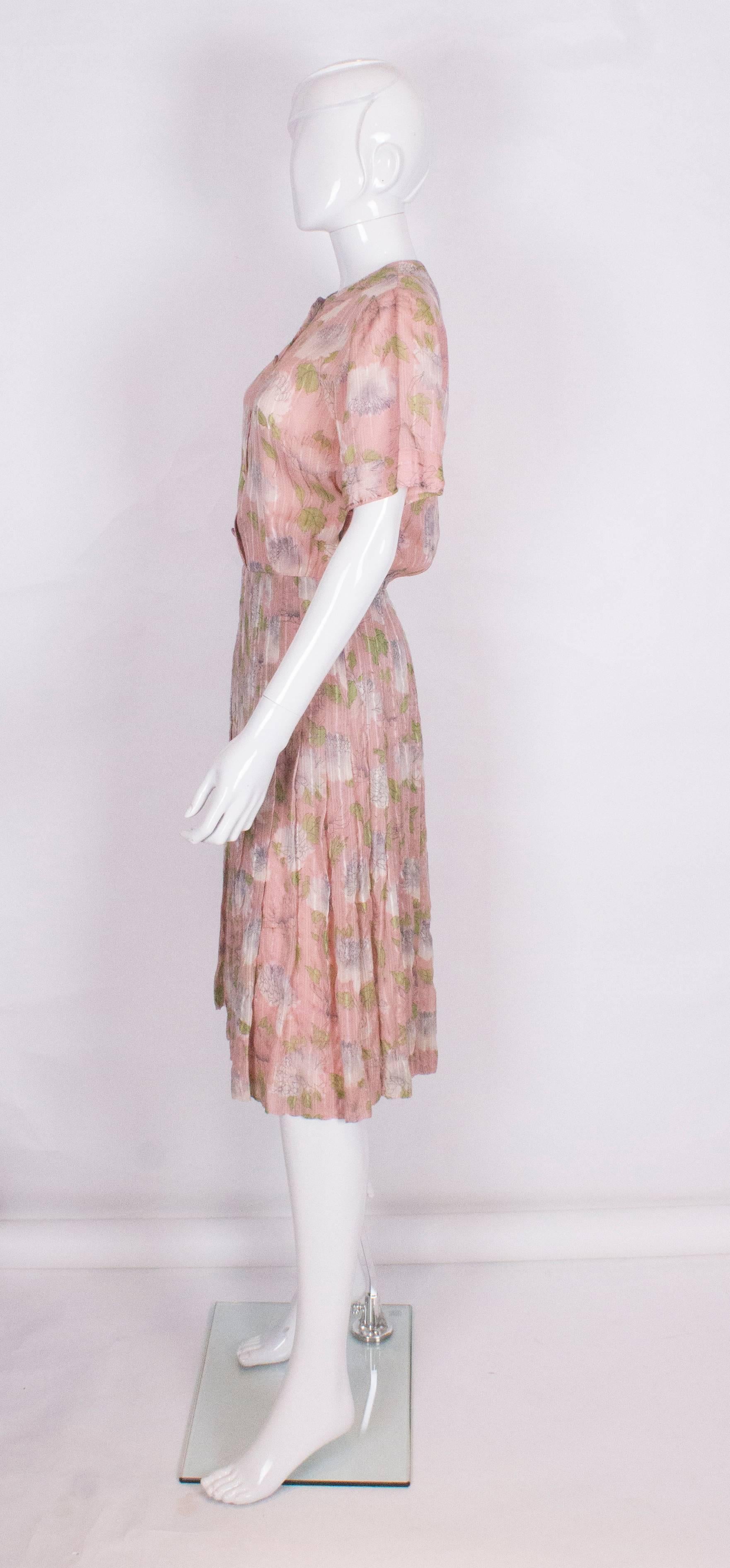 Beige A vintage 1940s floral print, pink summer cotton day dress