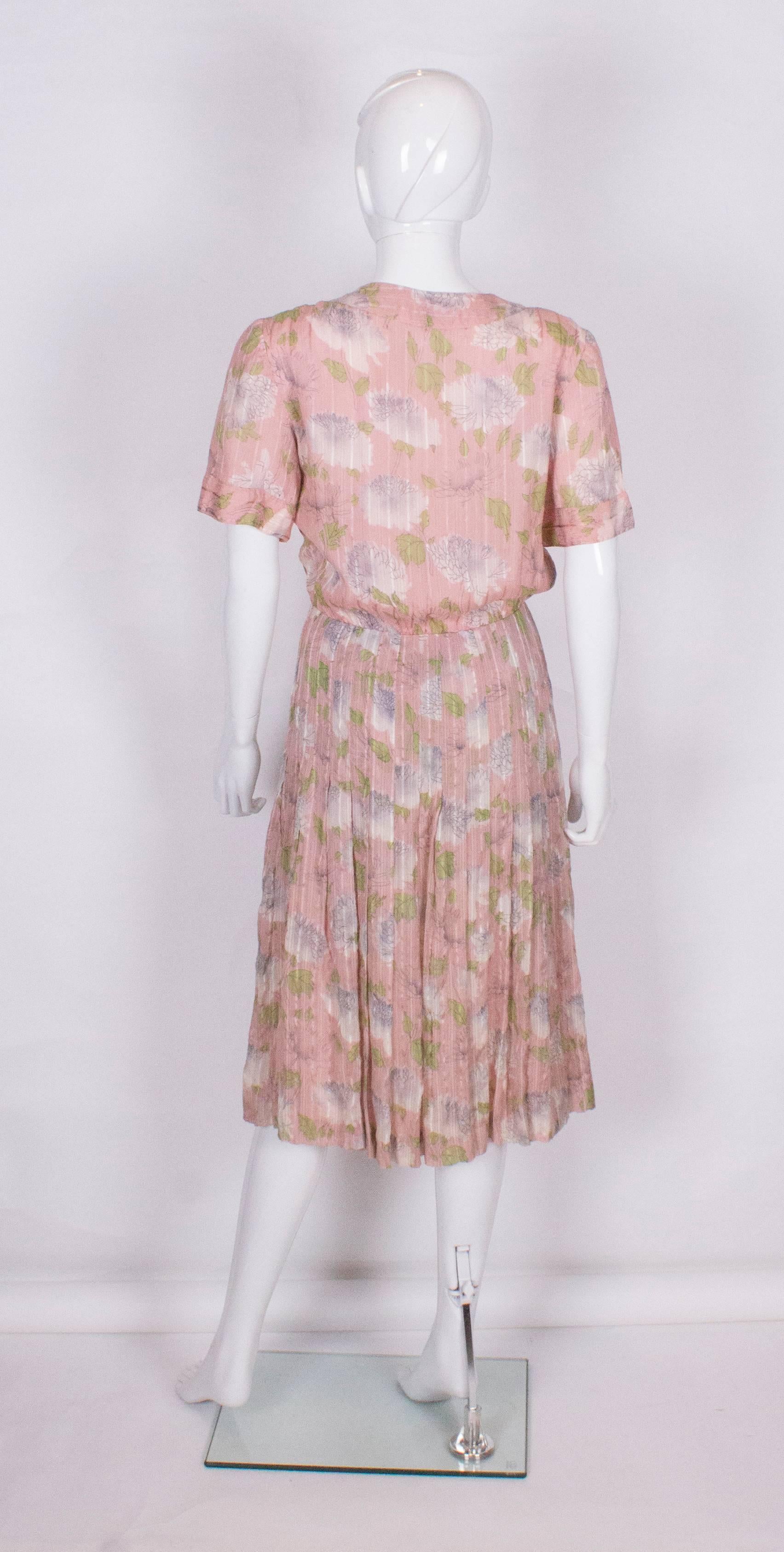 A vintage 1940s floral print, pink summer cotton day dress In Excellent Condition In London, GB
