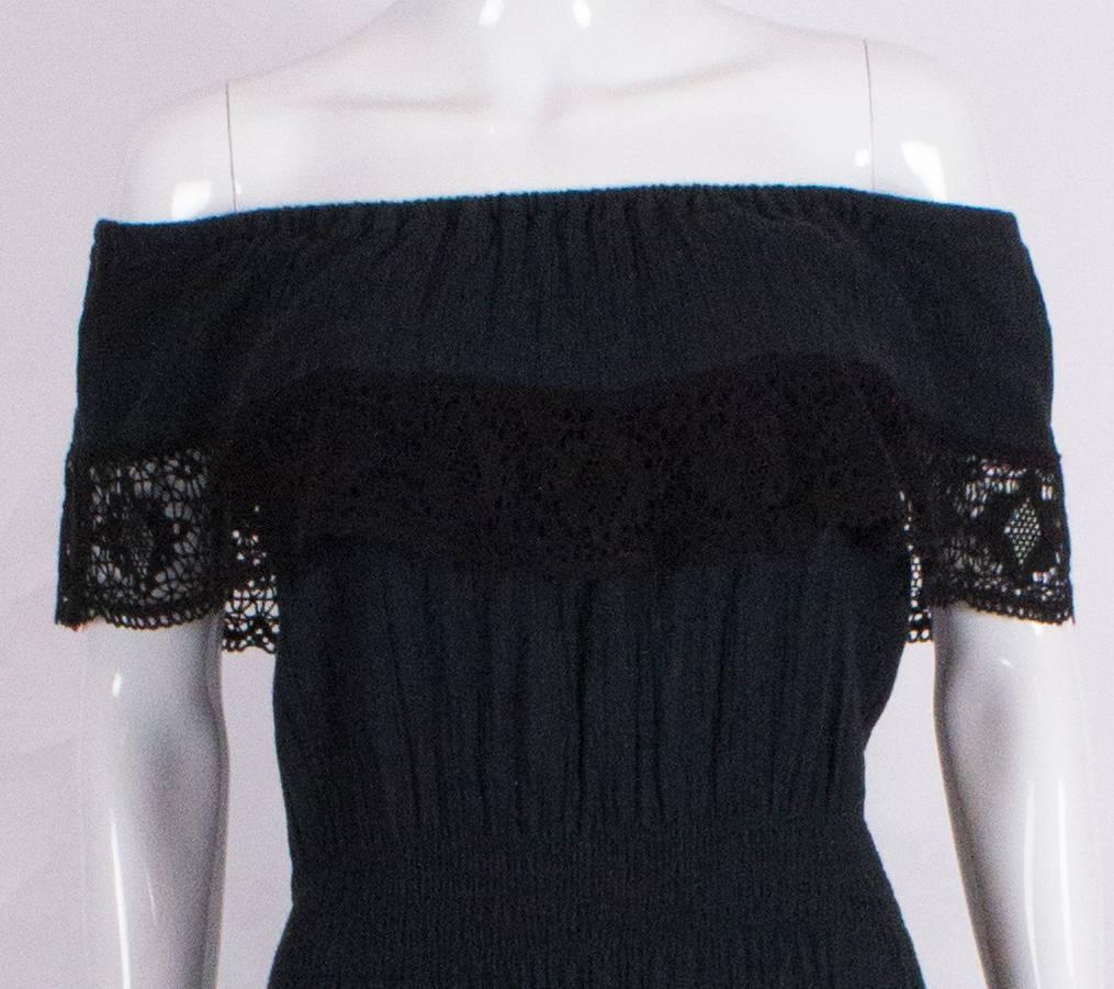 Black On/Off Shoulder Dress with Crochet Border and Ribbon Detail 1