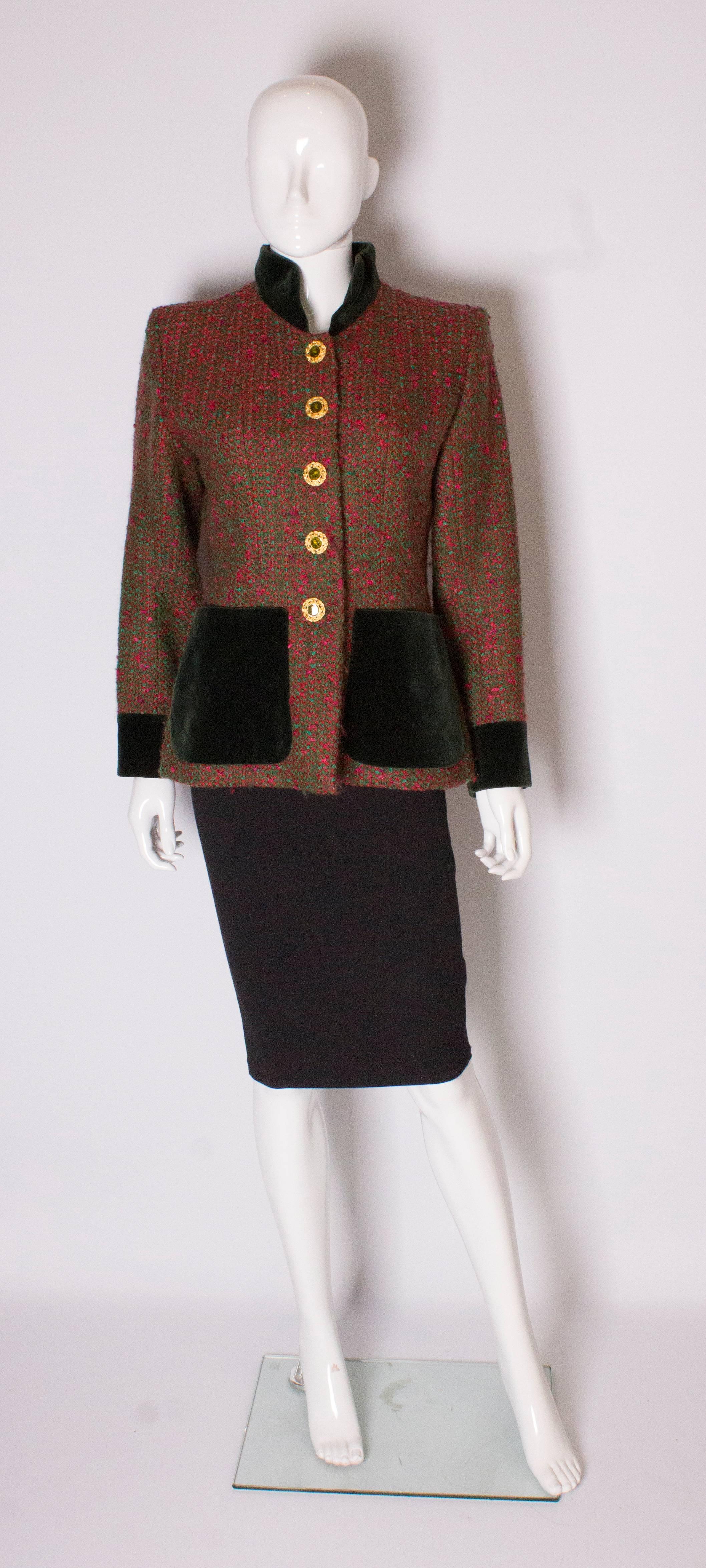 Vintage jacket by Yves Saint Laurent, Rive Gauche.The jacket is made of a red and green wool mix with a green velvet collar, cuffs and pockets. Size 40, with a 5 button front opening and green acetate lining.