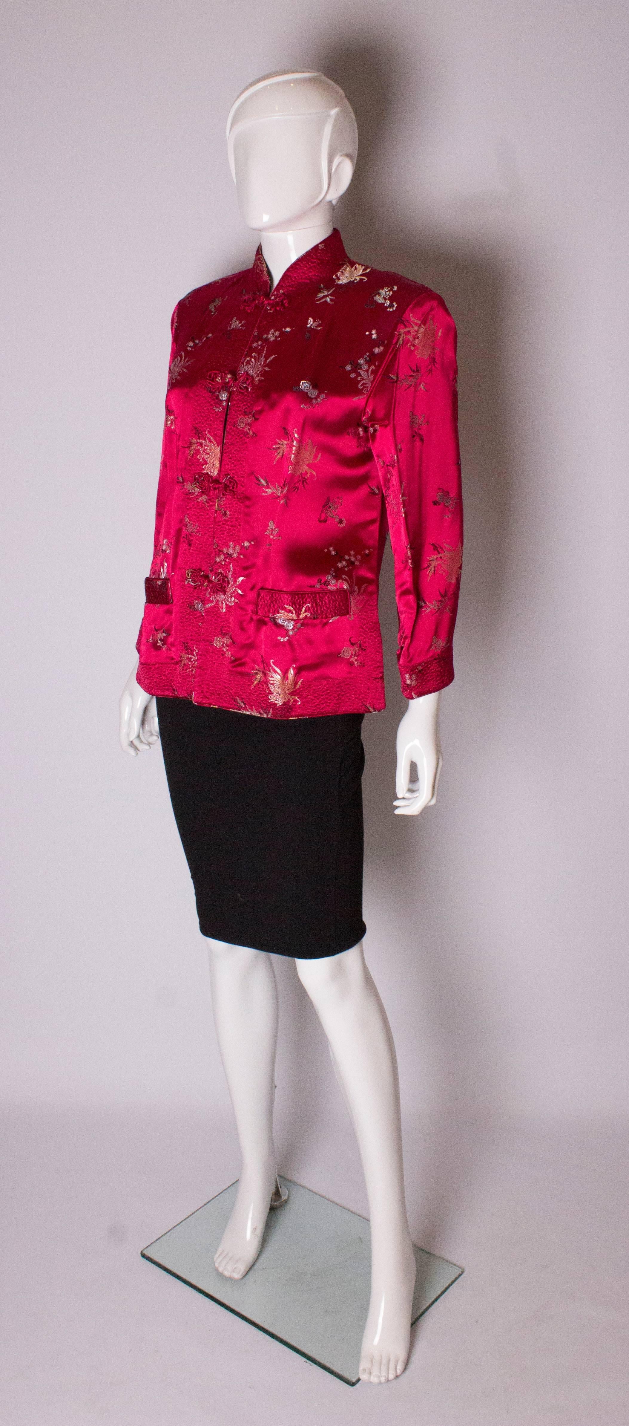 This is a great jacket for the festive period. In a lovely crimson silk, with black lining ( or vice verca) the jacket has a shawl collar, quilting detail on the cuffs, hem and central panel and has two pockets on each side. The jacket has 4'' slit