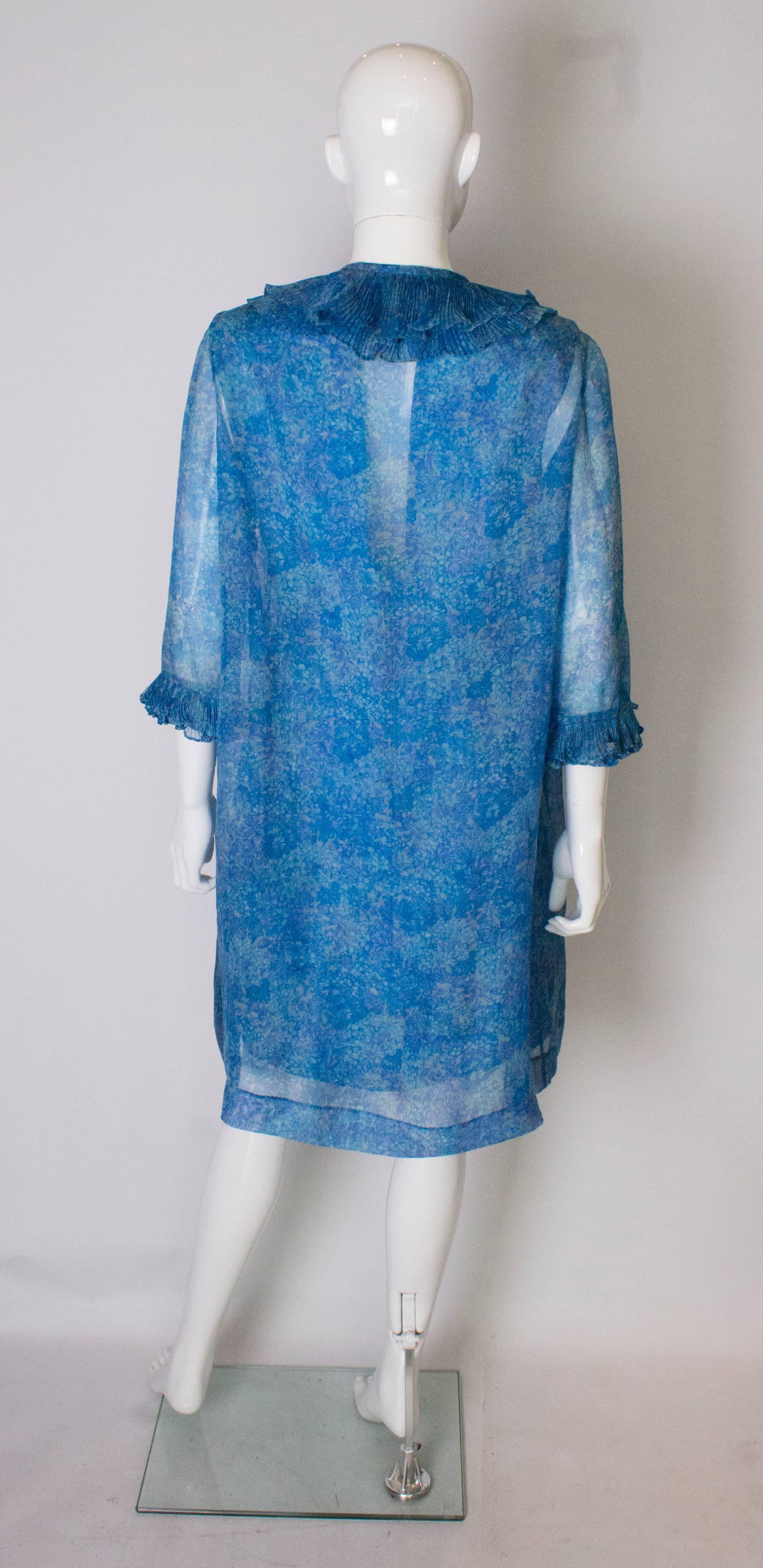 A Vintage 1960s blue printed Cocktail Dress and sheer matching Jacket 1