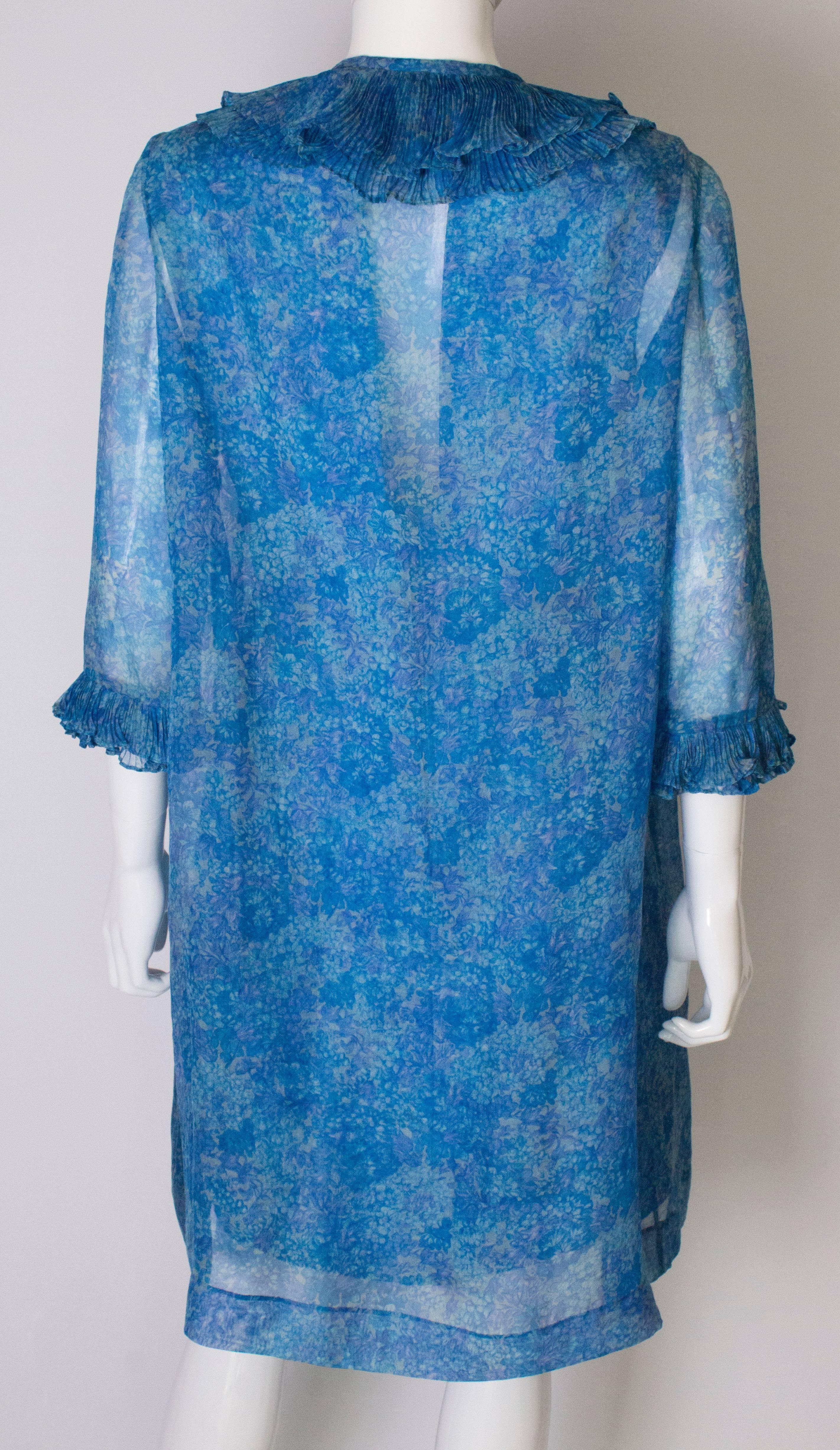 A Vintage 1960s blue printed Cocktail Dress and sheer matching Jacket 2