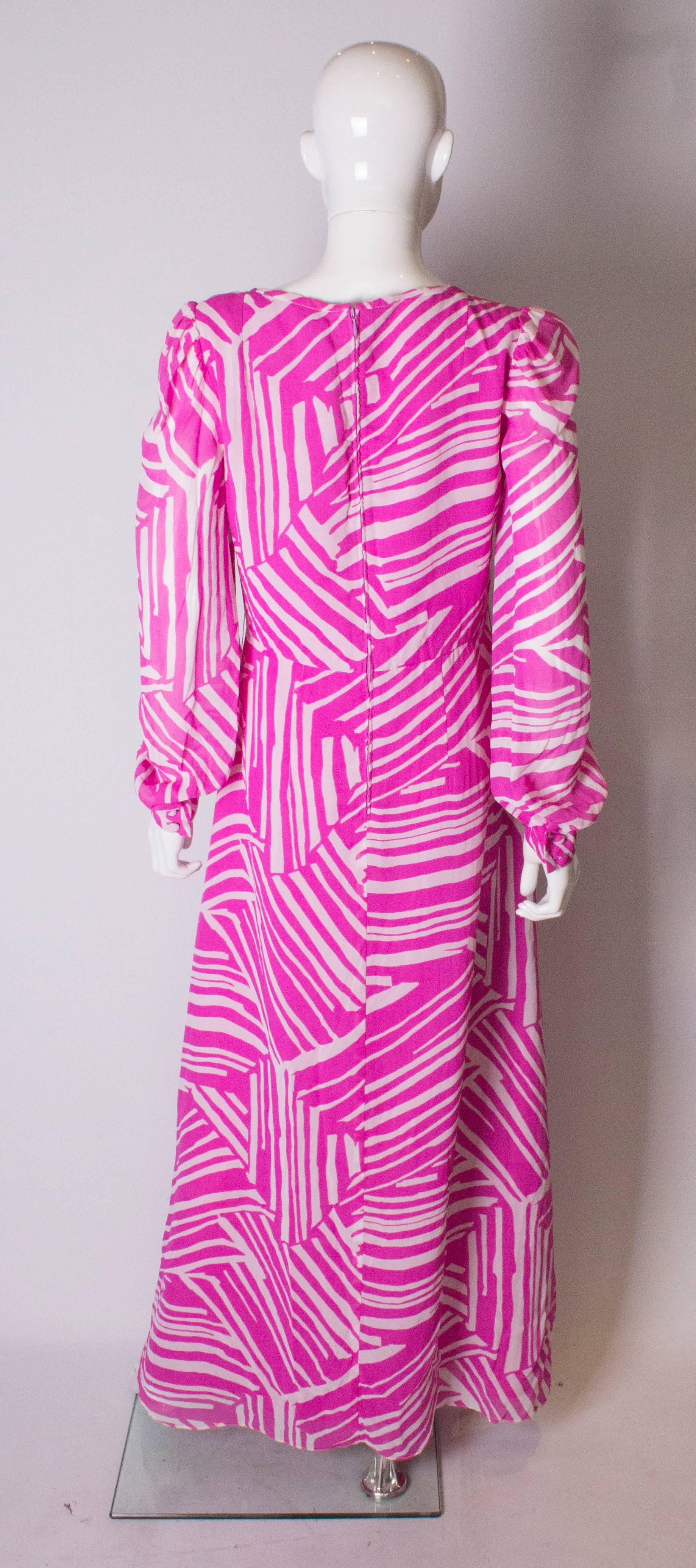 A Vintage 1970s abstract printed Pink and White evening Gown 2